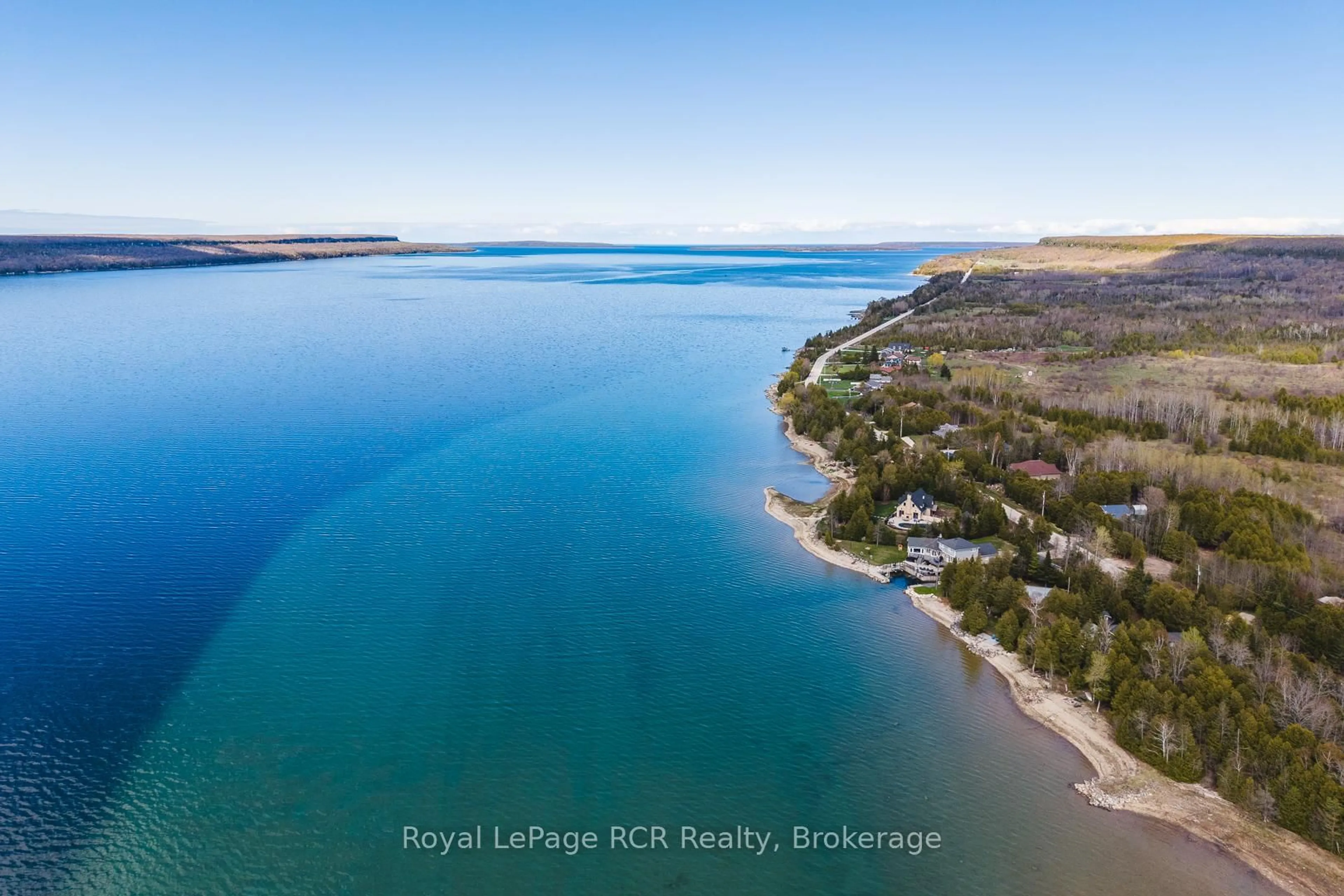 A pic from outside/outdoor area/front of a property/back of a property/a pic from drone, water/lake/river/ocean view for 502183 Grey Road 1 Rd, Georgian Bluffs Ontario N0H 2T0