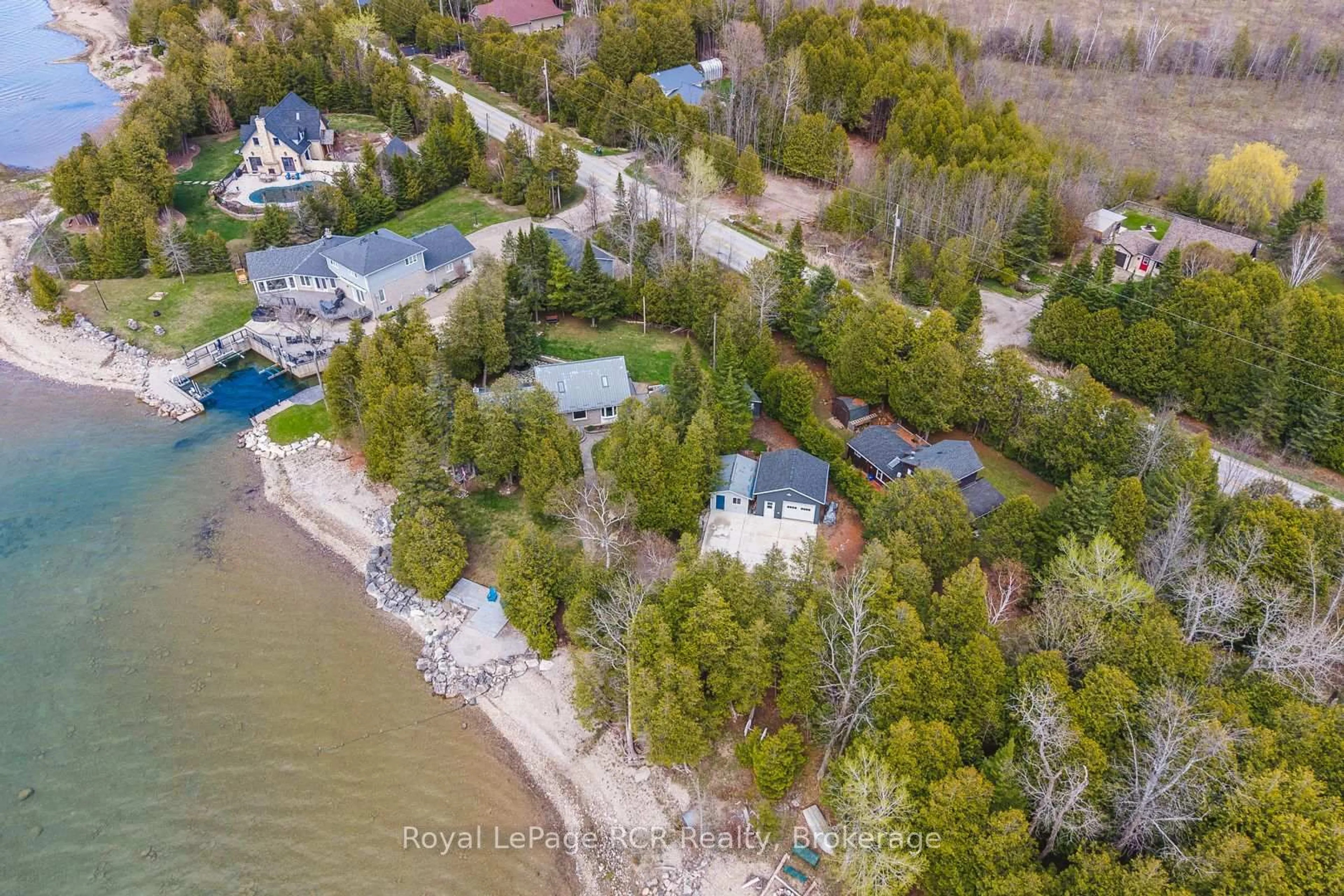 A pic from outside/outdoor area/front of a property/back of a property/a pic from drone, water/lake/river/ocean view for 502183 Grey Road 1 Rd, Georgian Bluffs Ontario N0H 2T0