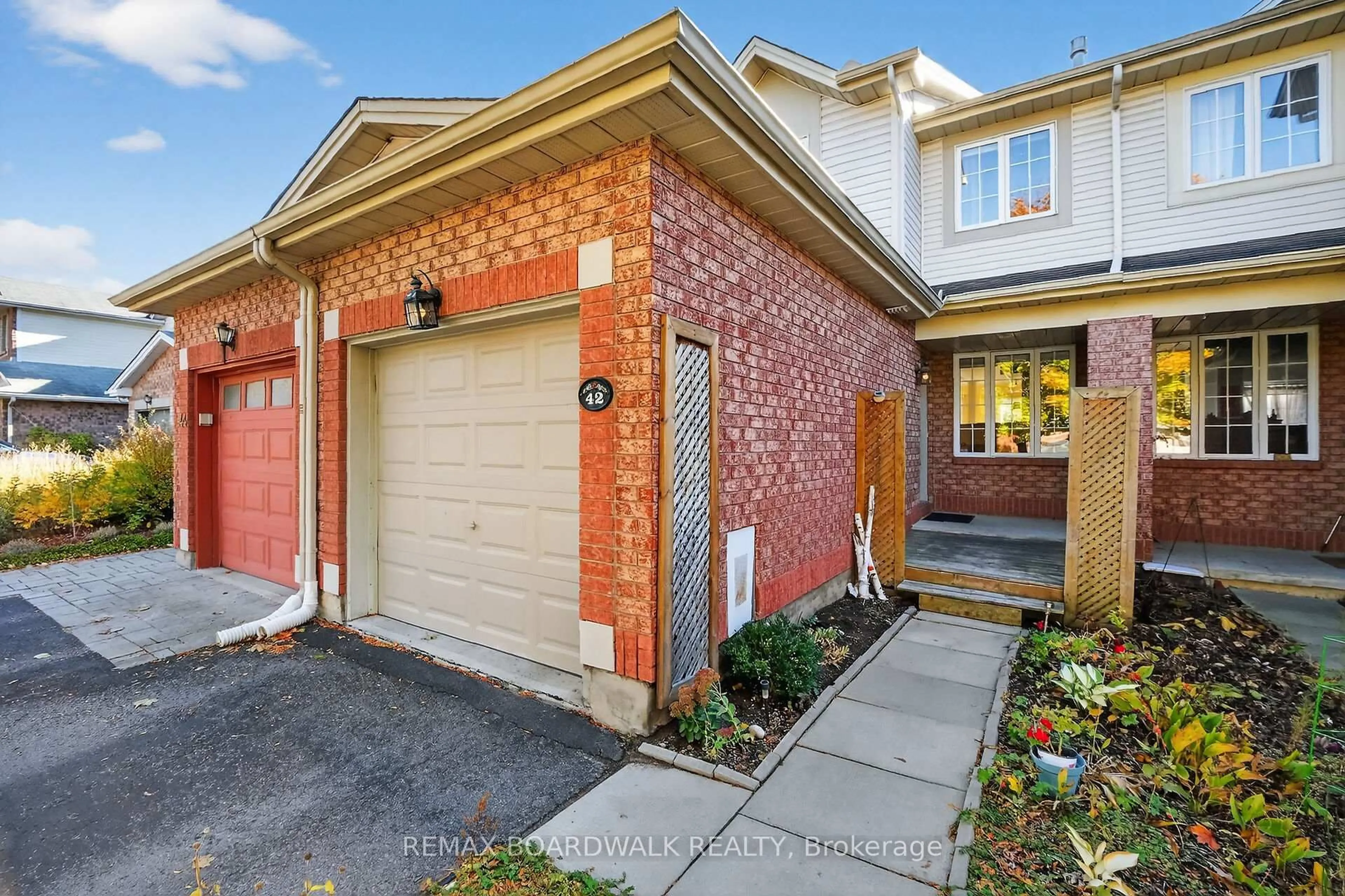 Home with brick exterior material, street for 42 College Circ, Ottawa Ontario K1K 4R8