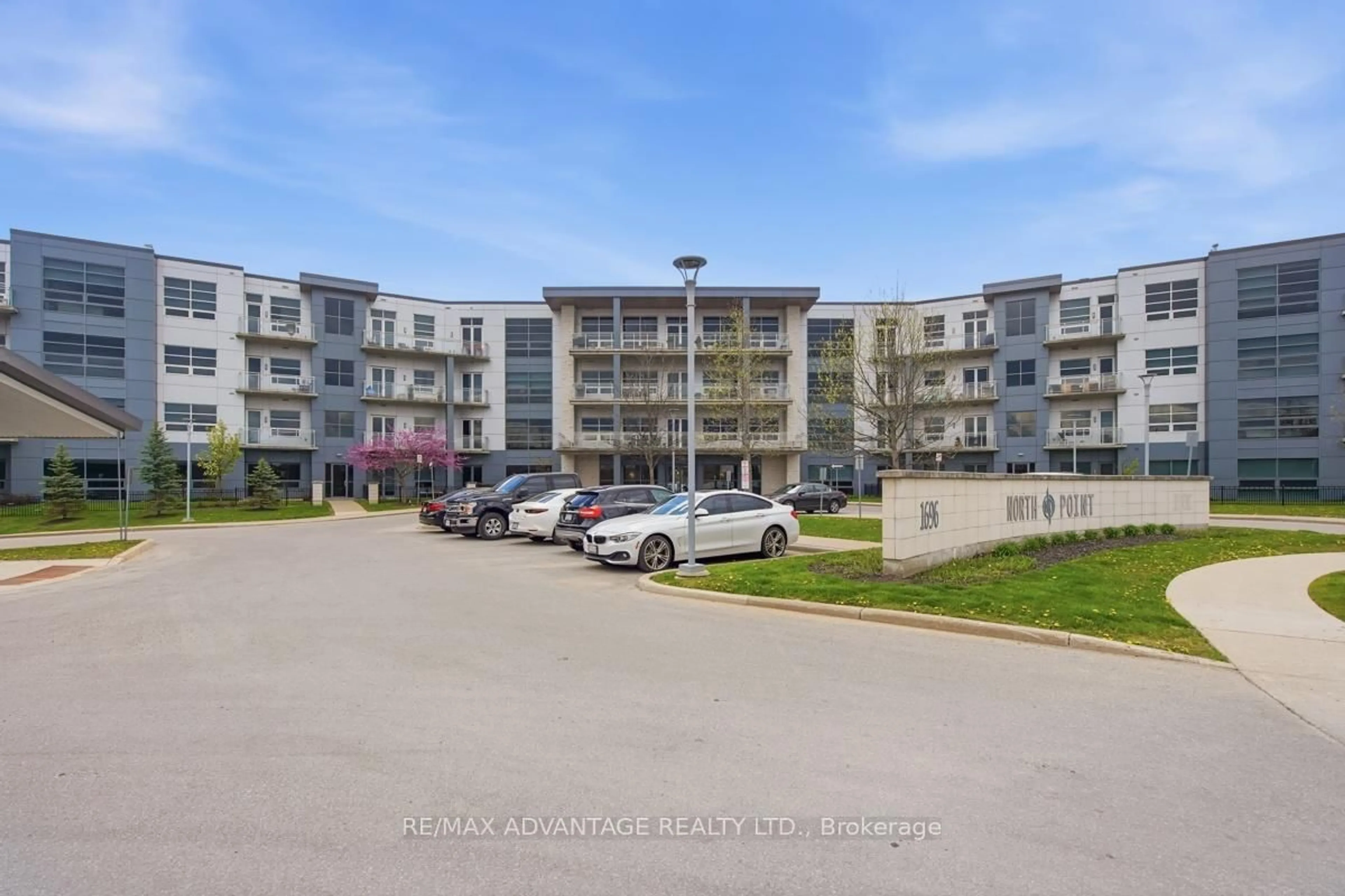 A pic from outside/outdoor area/front of a property/back of a property/a pic from drone, building for 1705 Fiddlehead Pl #207, London North Ontario N6G 0S1