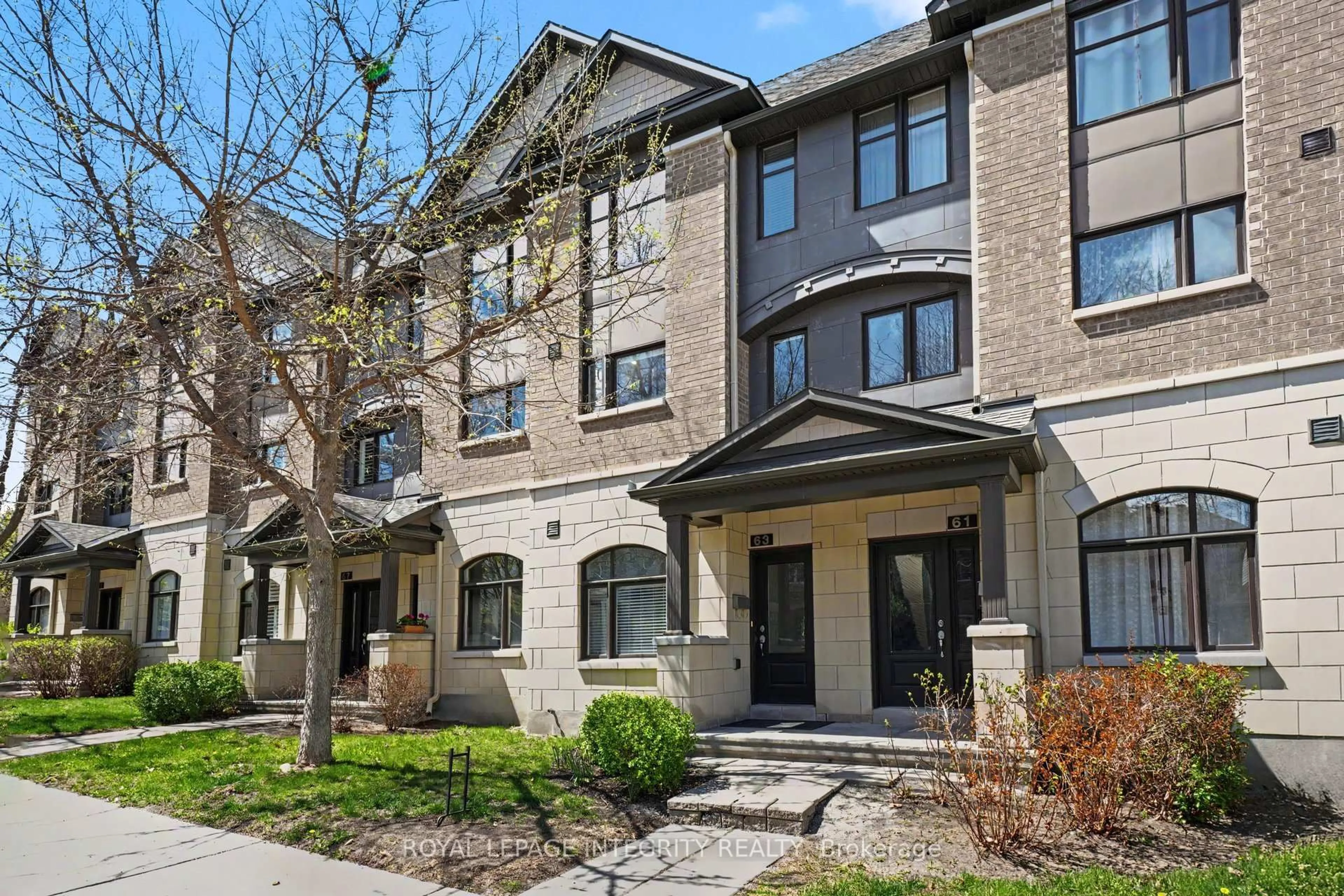 Home with brick exterior material, street for 63 Mersey Dr #40, Ottawa Ontario K2K 0H2