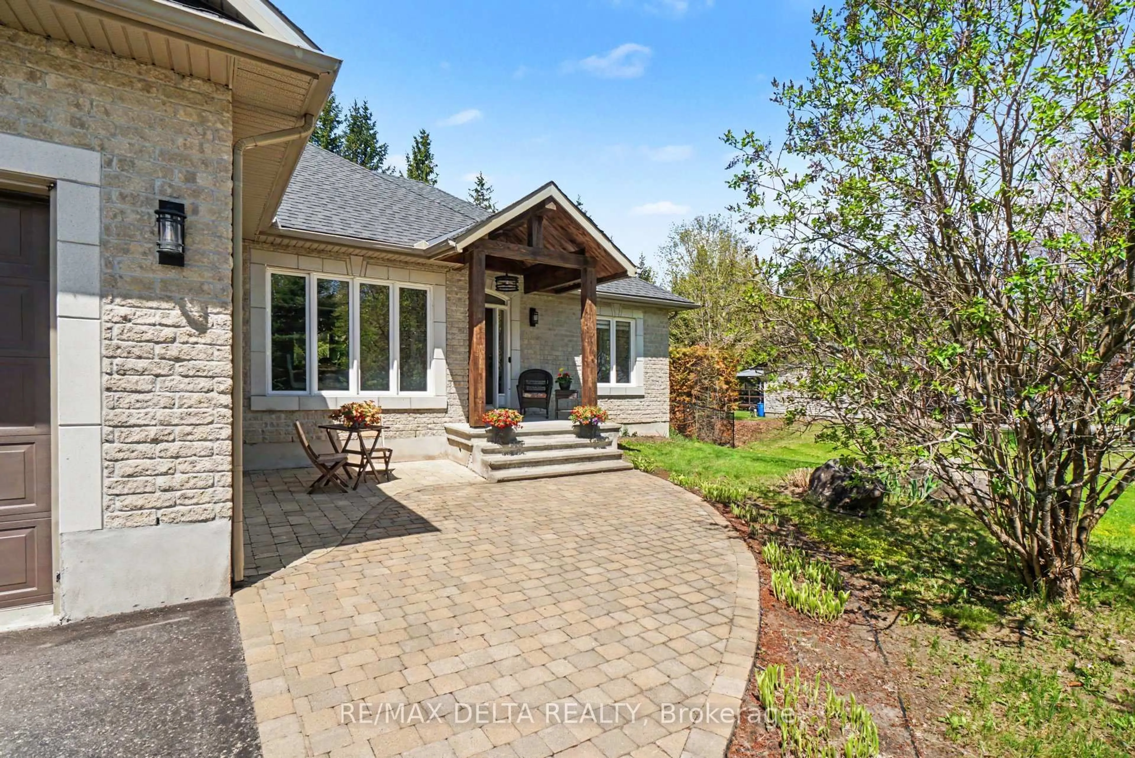 Home with brick exterior material, street for 2329 Old Highway 17 Highway, Clarence-Rockland Ontario K4K 1K7