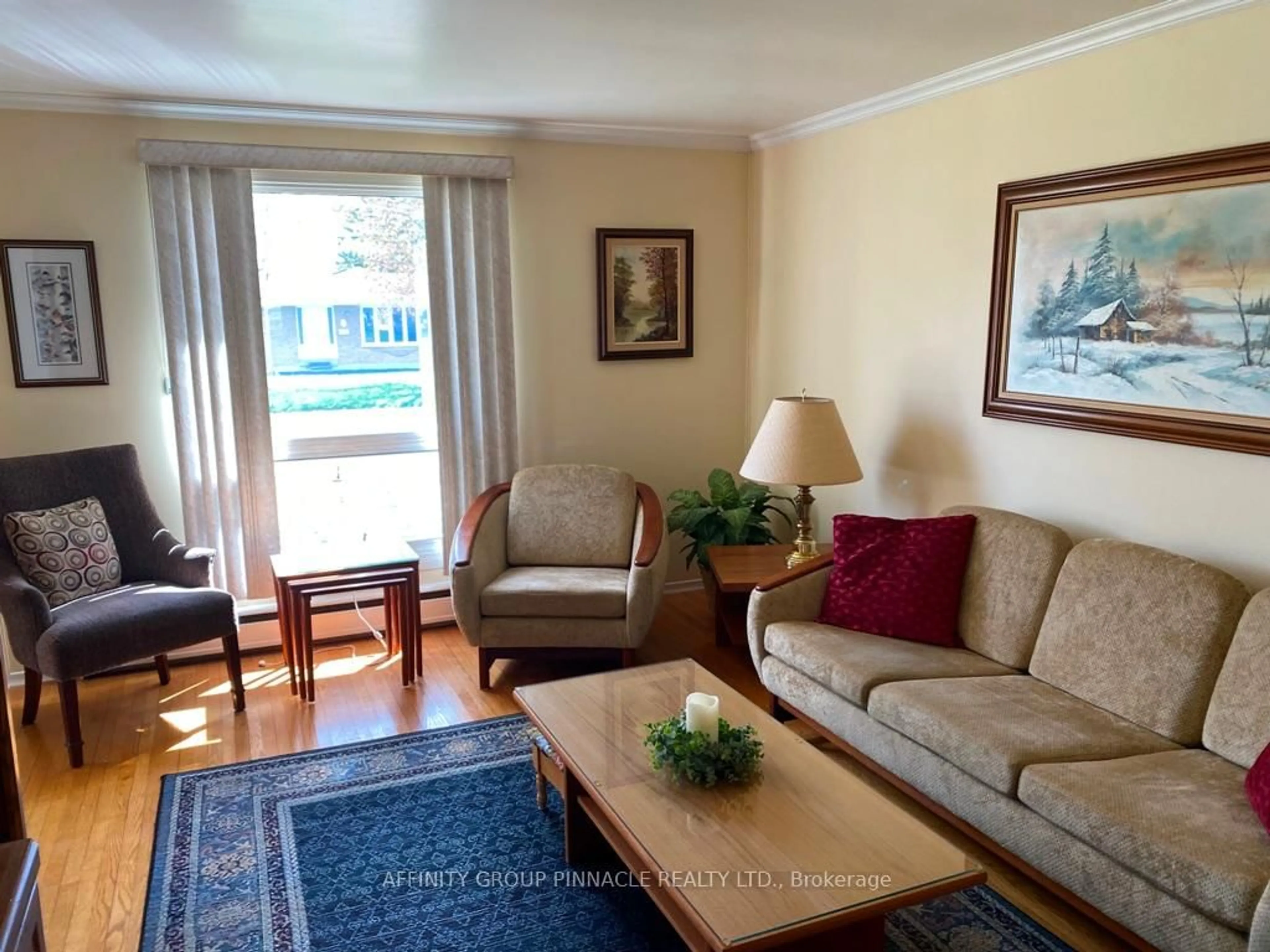 Living room with furniture, wood/laminate floor for 94 Sanderling Cres, Kawartha Lakes Ontario K9V 4N2