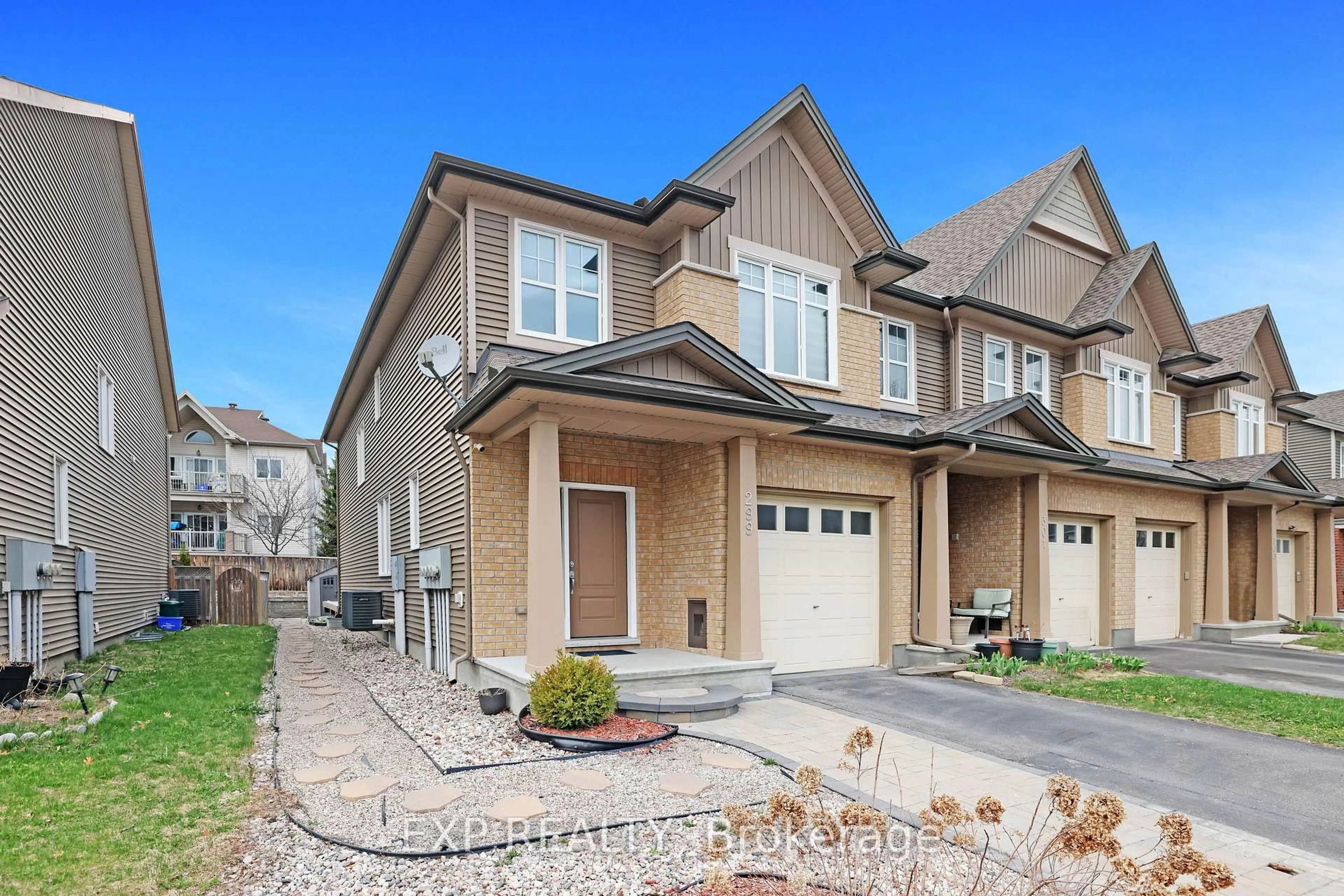 Home with brick exterior material, street for 299 Wood Acres Grve, Ottawa Ontario K1T 0B3