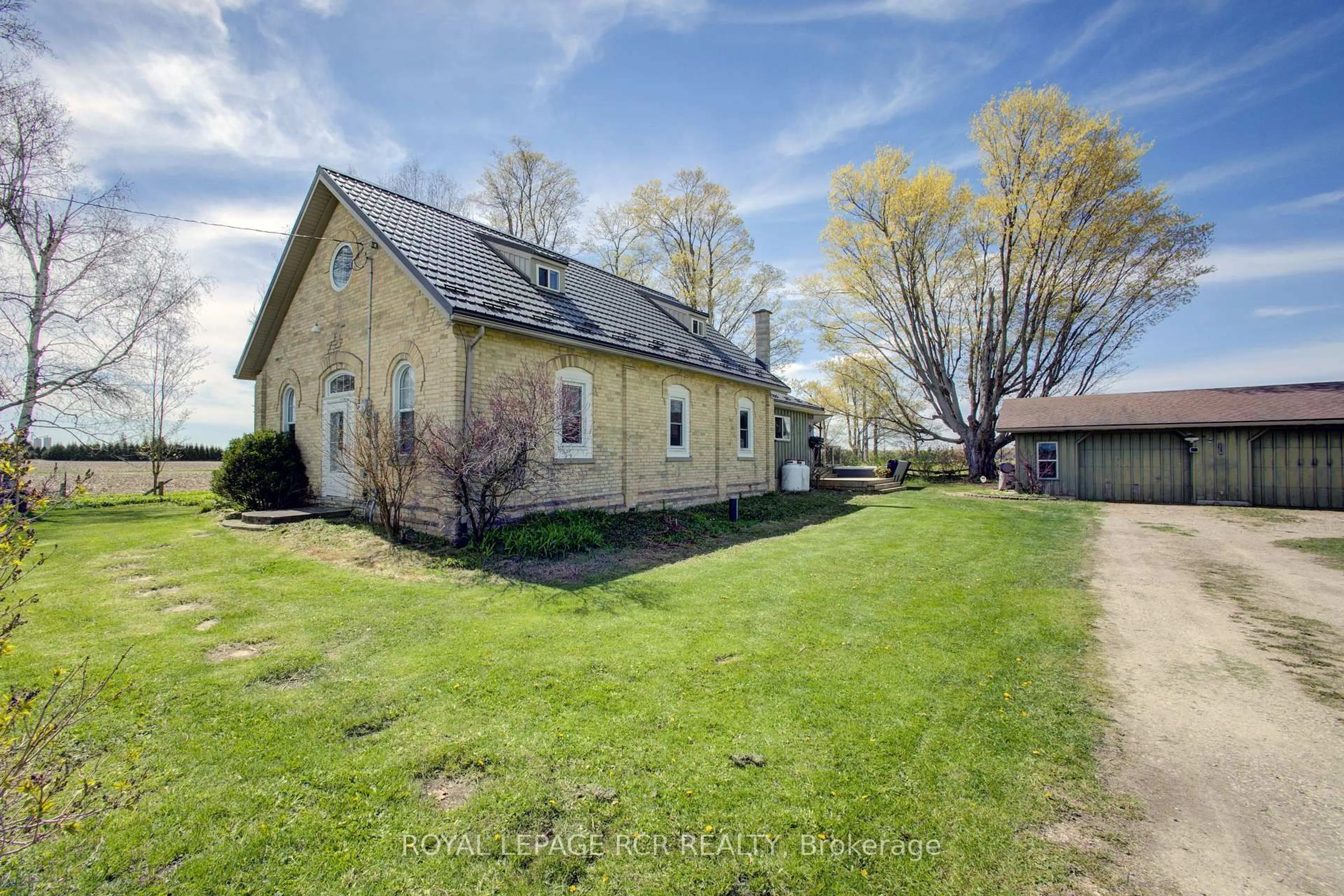 A pic from outside/outdoor area/front of a property/back of a property/a pic from drone, street for 8542 Concession 12, Mapleton Ontario N0G 2P0