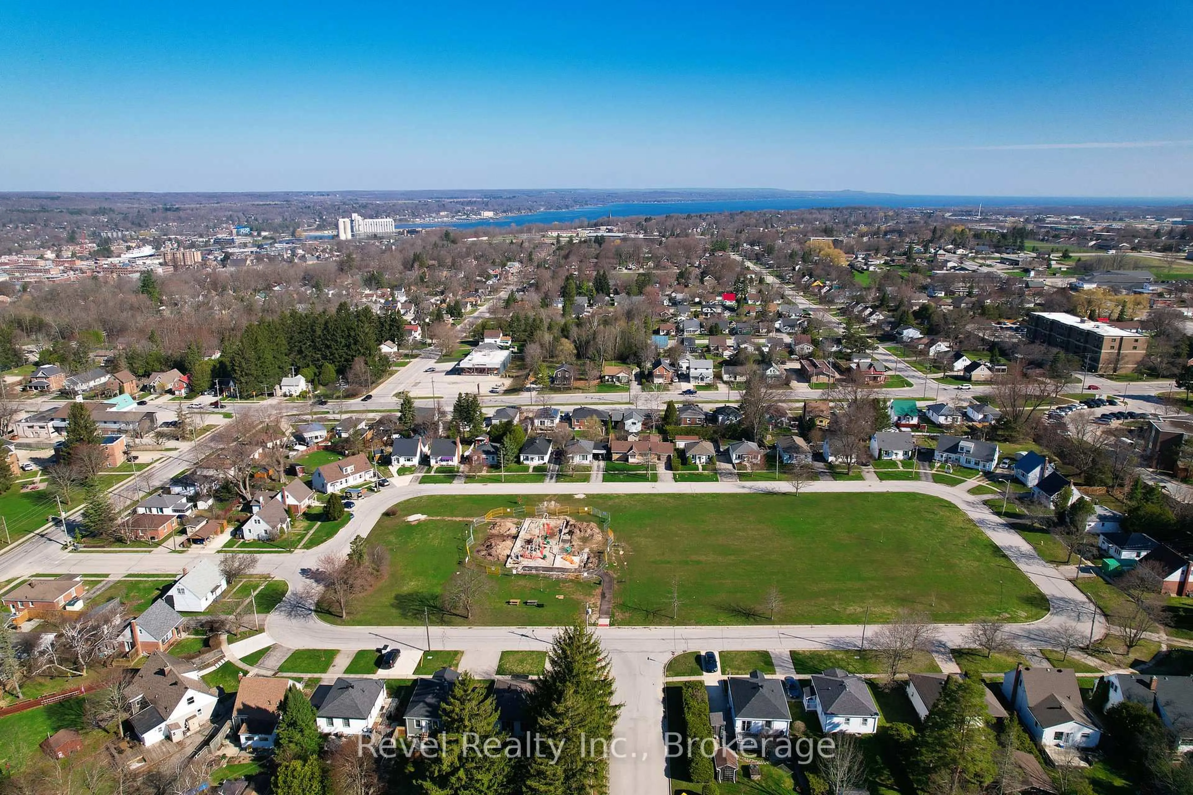 A pic from outside/outdoor area/front of a property/back of a property/a pic from drone, water/lake/river/ocean view for 701 5th St, Owen Sound Ontario N4K 1E4