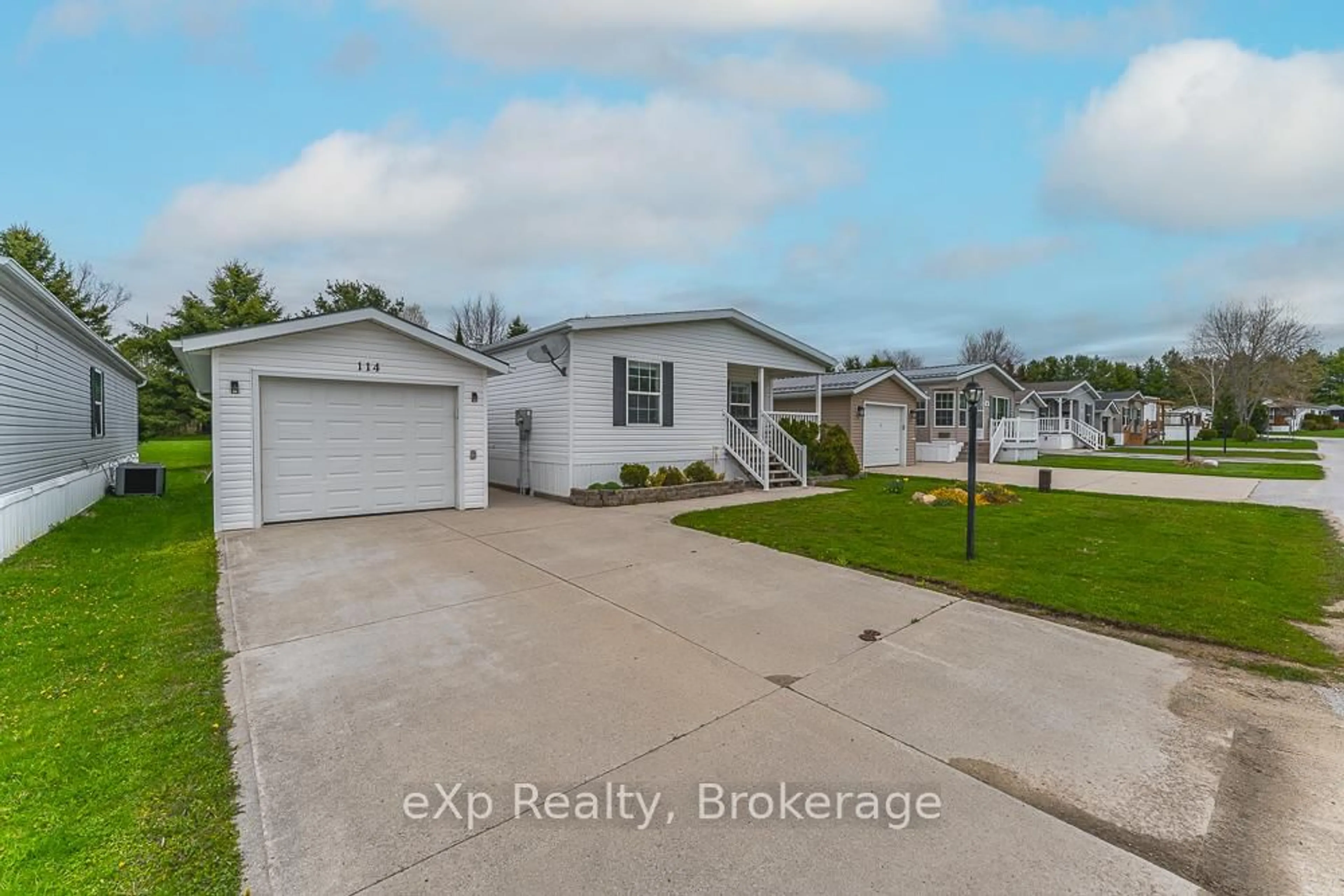 A pic from outside/outdoor area/front of a property/back of a property/a pic from drone, water/lake/river/ocean view for 114 Rosewood Dr, Georgian Bluffs Ontario N4K 5N5