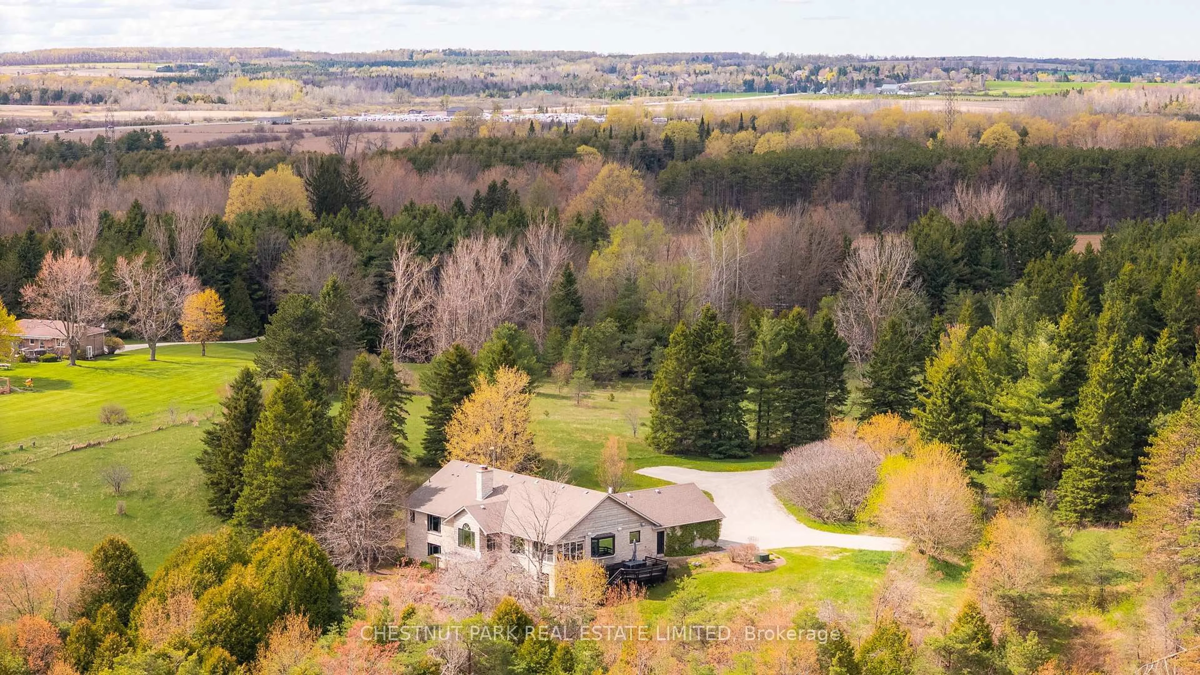 A pic from outside/outdoor area/front of a property/back of a property/a pic from drone, forest/trees view for 286364 10th Sdrd, Mono Ontario L9W 6P7