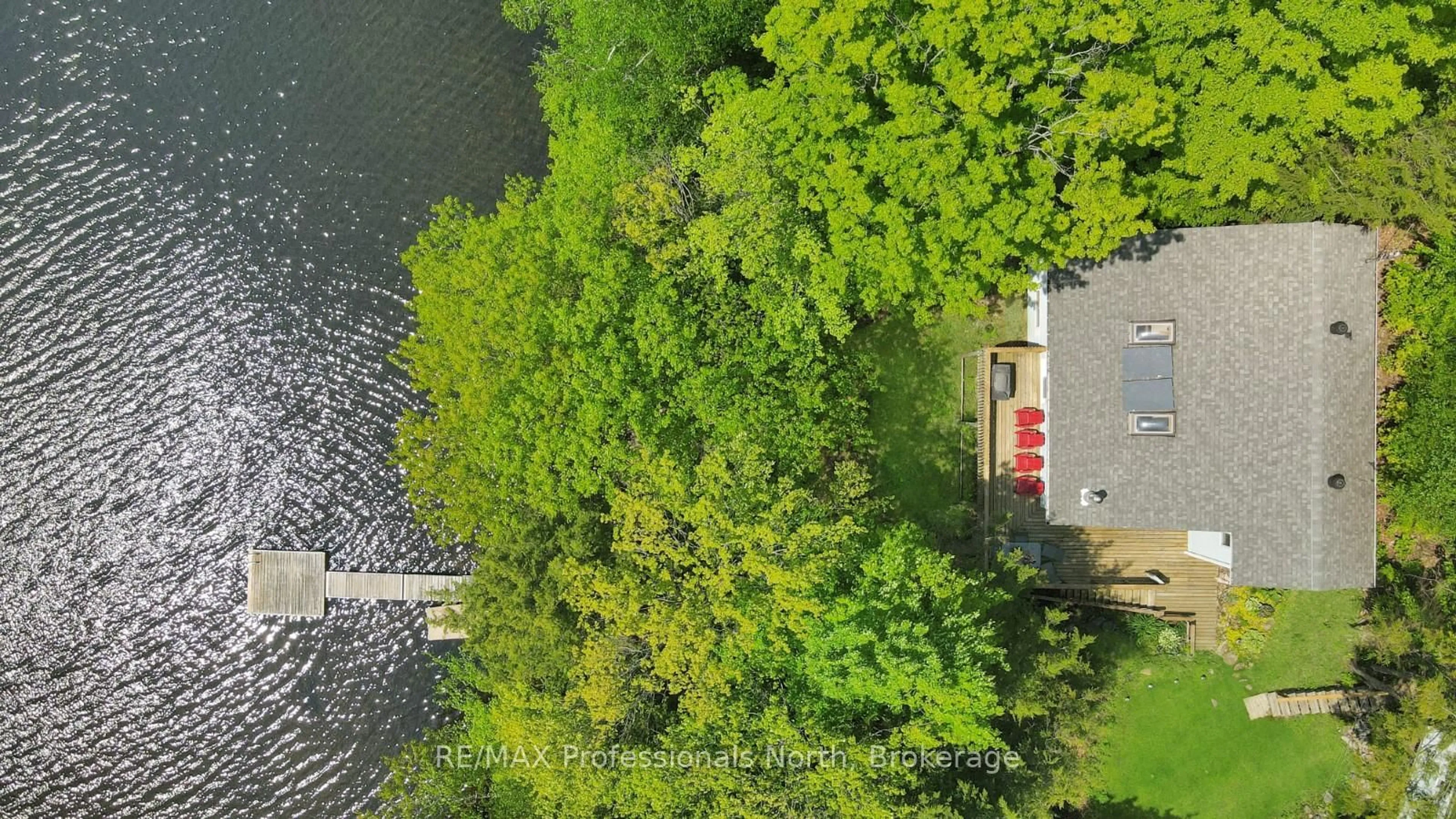 A pic from outside/outdoor area/front of a property/back of a property/a pic from drone, water/lake/river/ocean view for 1847 Chandler Dr, Dysart et al Ontario K0M 1S0