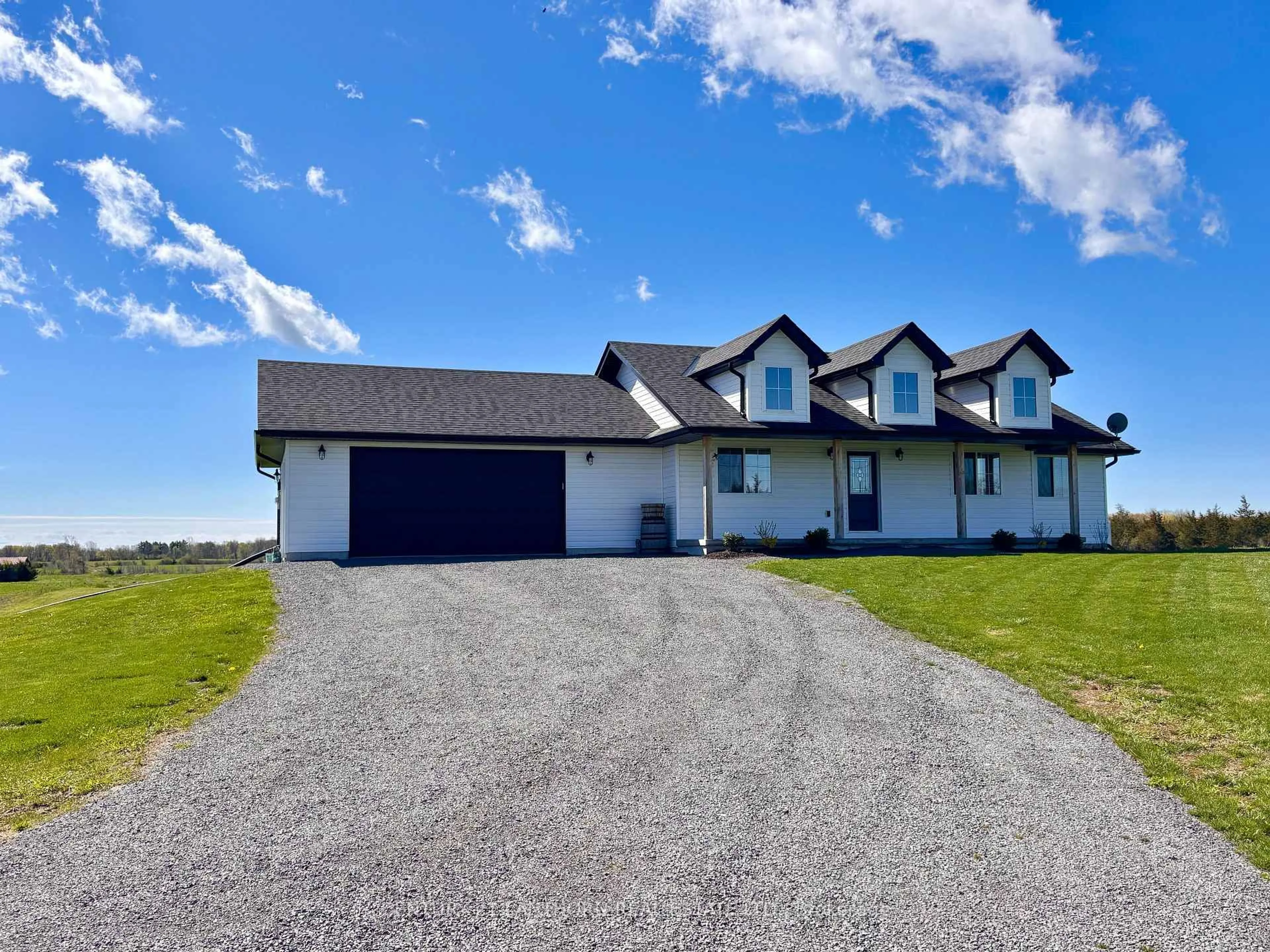 A pic from outside/outdoor area/front of a property/back of a property/a pic from drone, unknown for 1232 County Road 7, Prince Edward County Ontario K0K 2T0