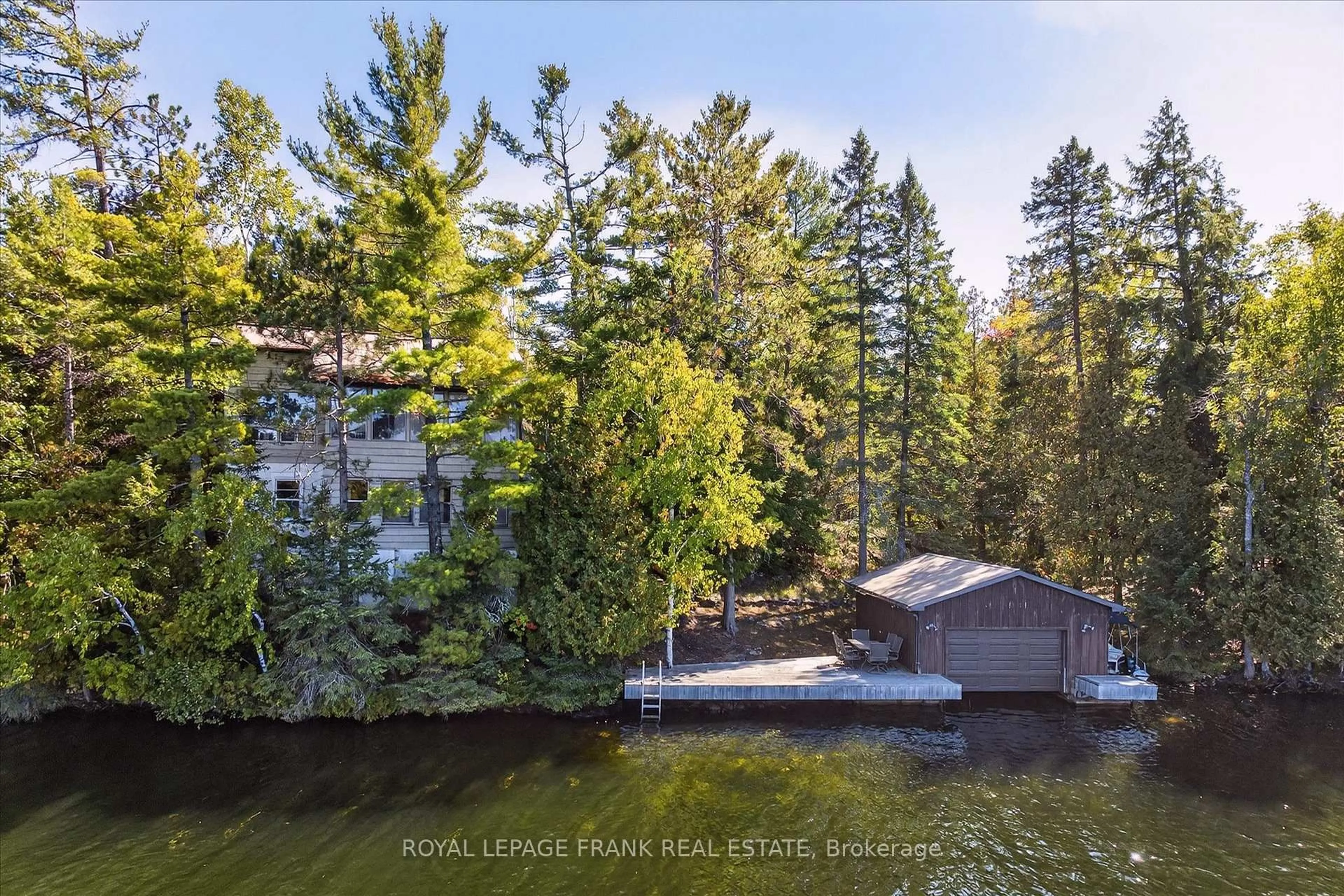 A pic from outside/outdoor area/front of a property/back of a property/a pic from drone, water/lake/river/ocean view for 1702 South Bayshore Rd, Douro-Dummer Ontario K0L 2H0
