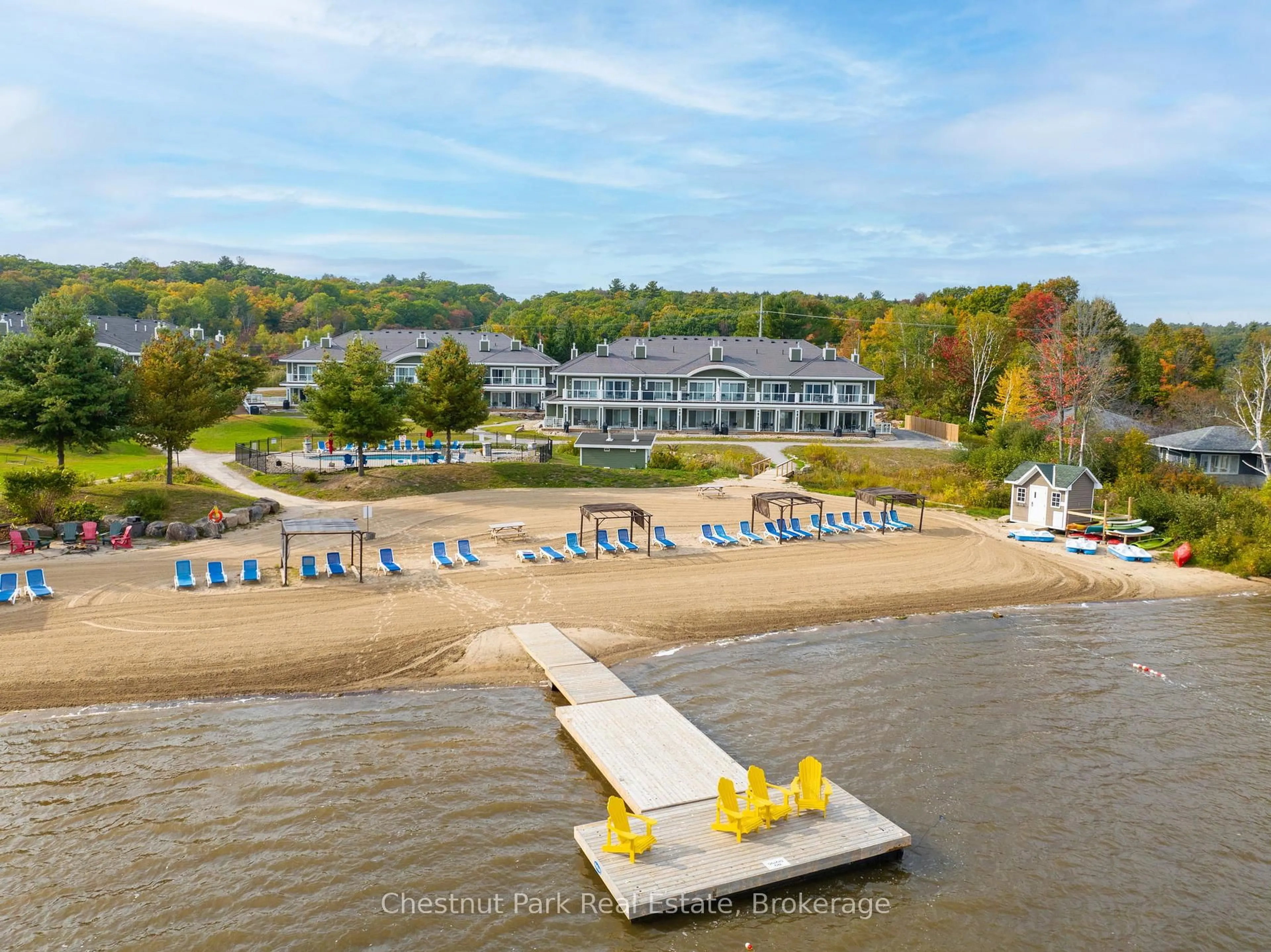 A pic from outside/outdoor area/front of a property/back of a property/a pic from drone, water/lake/river/ocean view for 1869 Muskoka Rd 118 Highway #BHV A202, Muskoka Lakes Ontario P1L 1W8