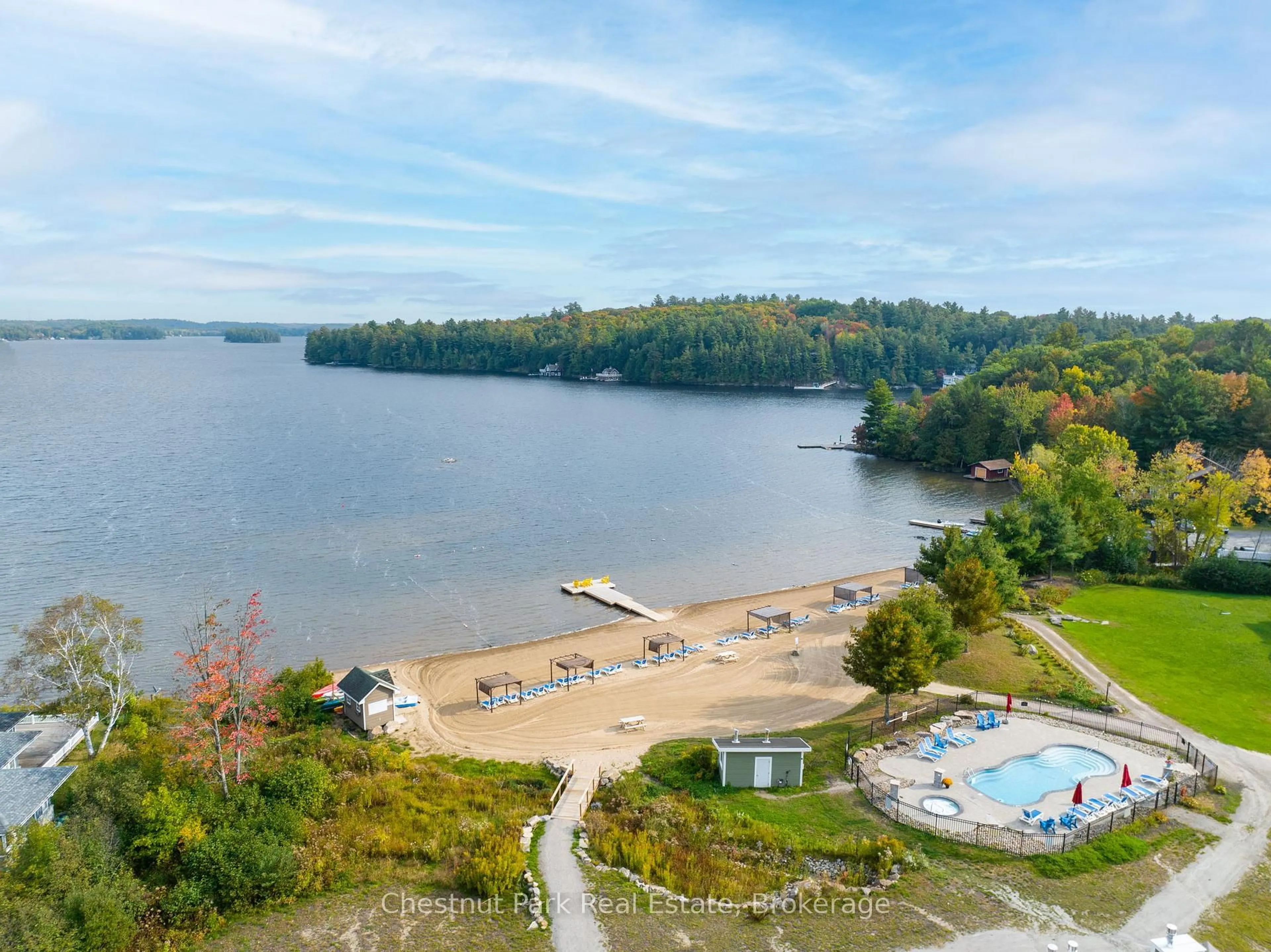 A pic from outside/outdoor area/front of a property/back of a property/a pic from drone, water/lake/river/ocean view for 1869 Muskoka Rd 118 Highway #BHV A202, Muskoka Lakes Ontario P1L 1W8