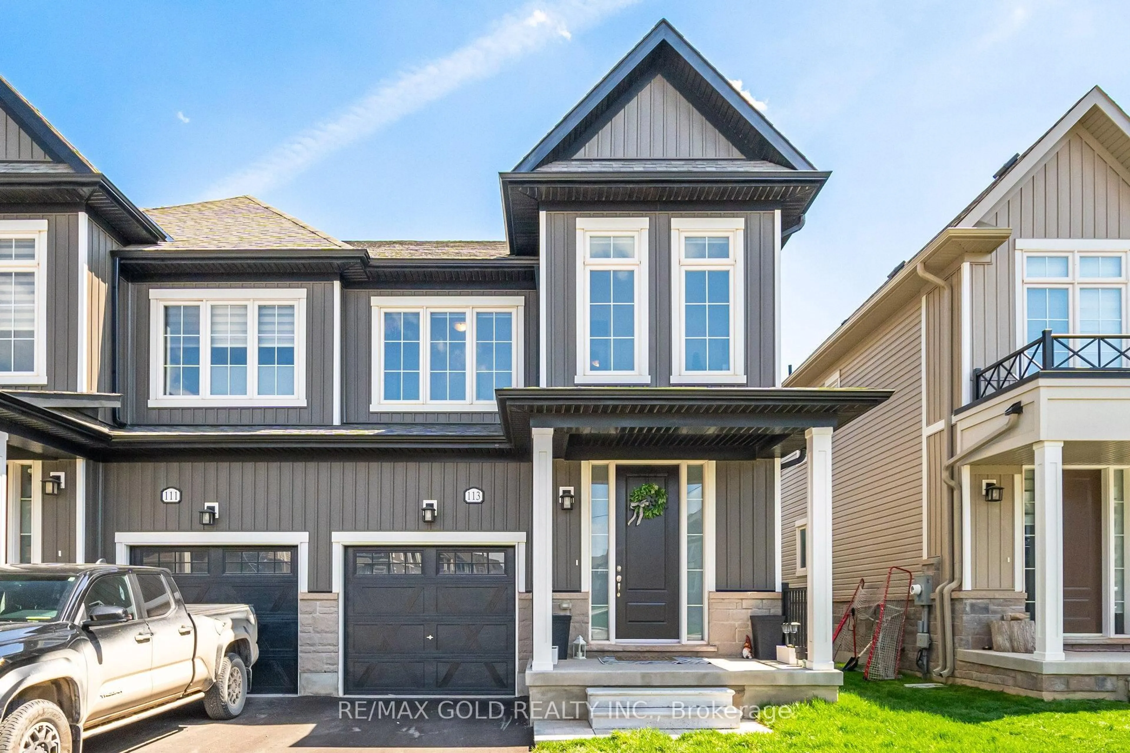 Home with vinyl exterior material, street for 113 Molozzi St, Erin Ontario N0B 1T0