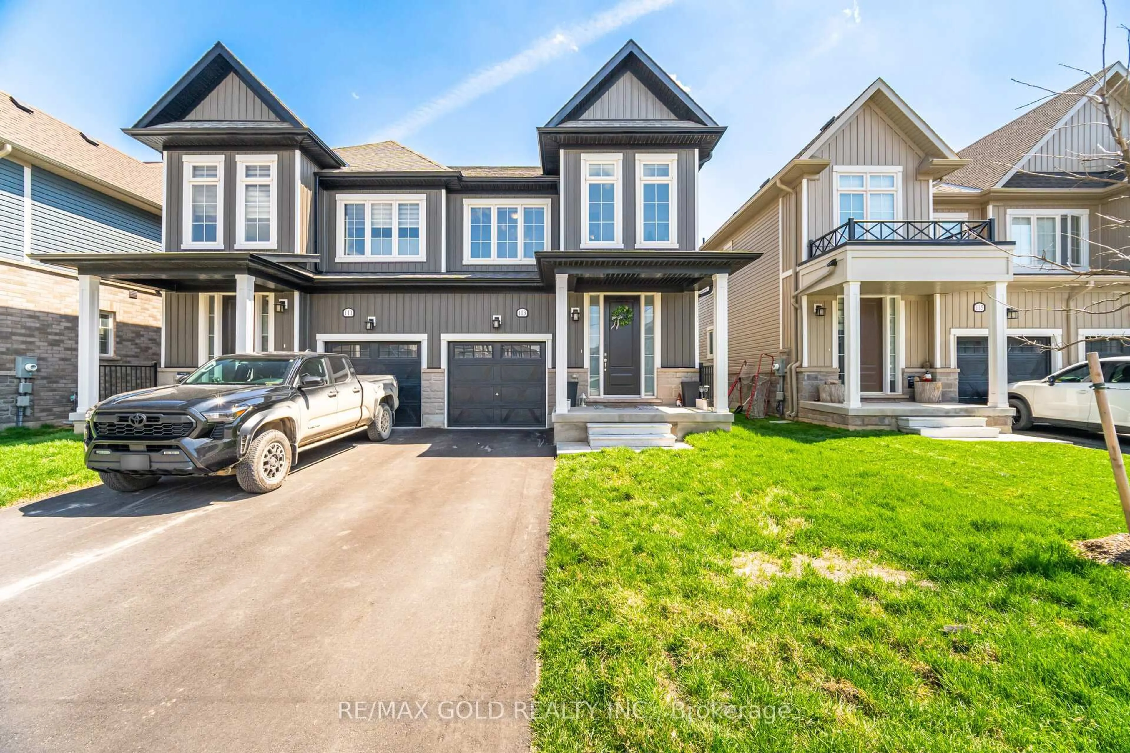 Home with vinyl exterior material, street for 113 Molozzi St, Erin Ontario N0B 1T0