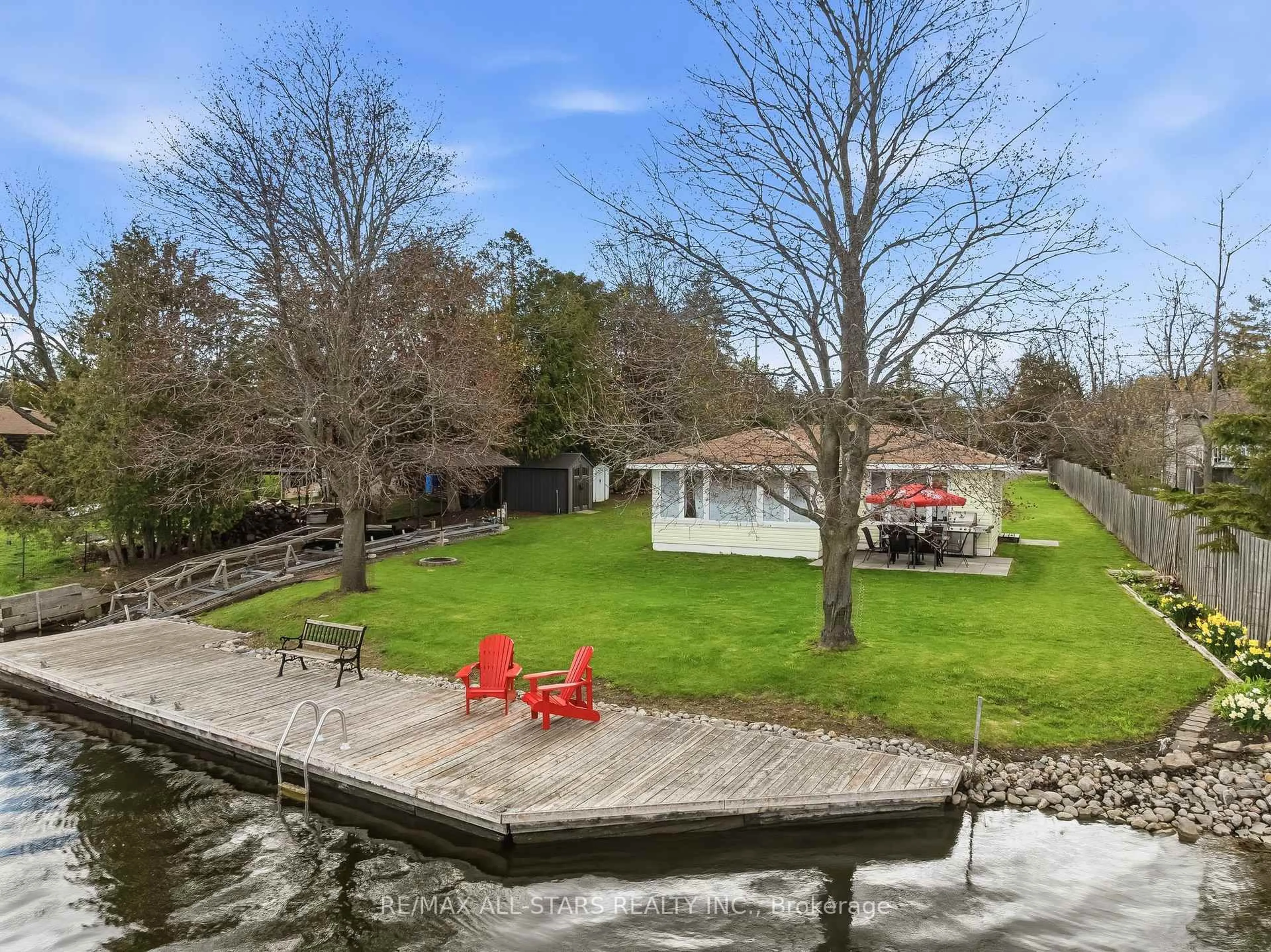 A pic from outside/outdoor area/front of a property/back of a property/a pic from drone, water/lake/river/ocean view for 42 Riverside Dr, Kawartha Lakes Ontario K9V 0H6