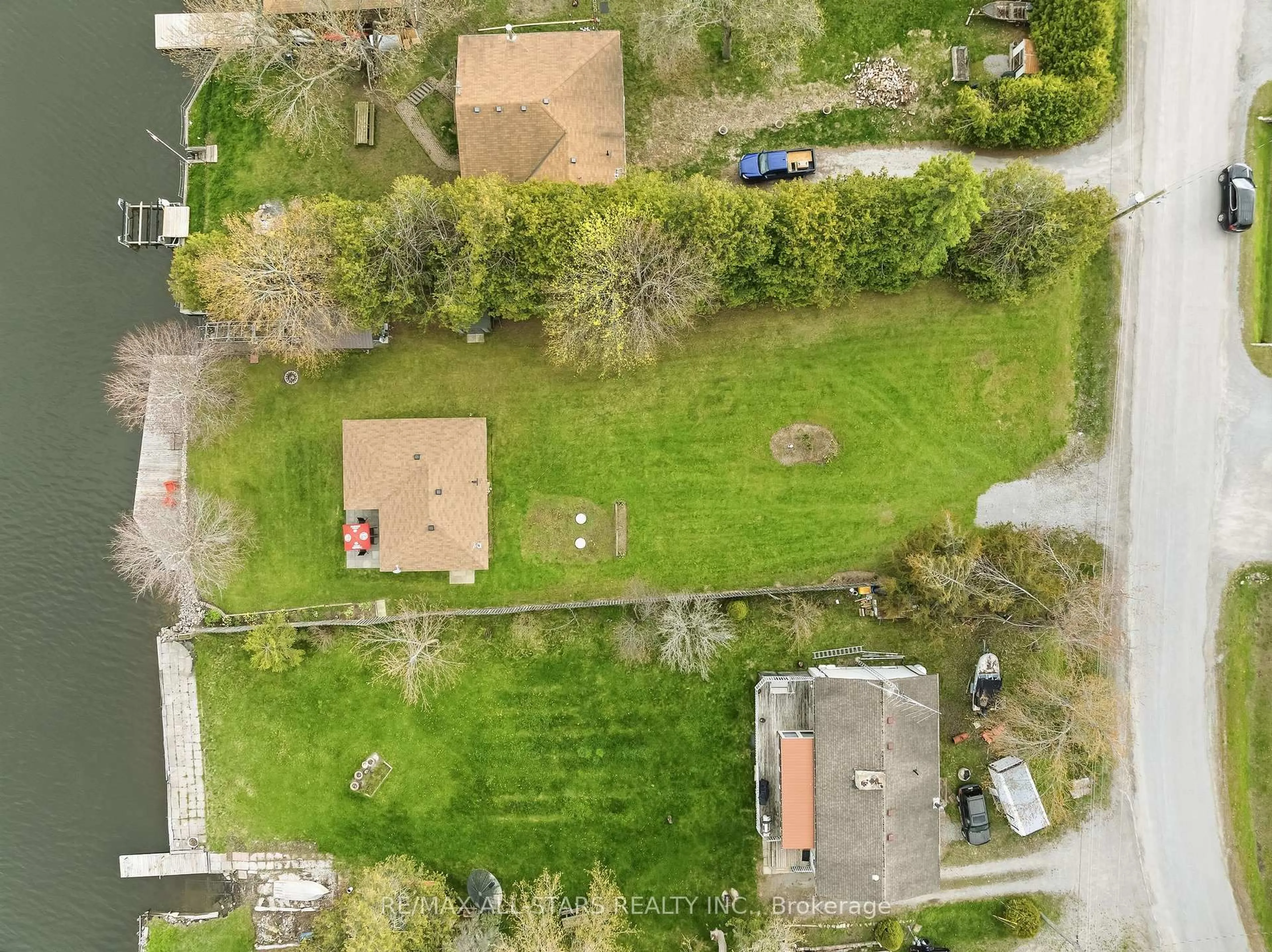 A pic from outside/outdoor area/front of a property/back of a property/a pic from drone, street for 42 Riverside Dr, Kawartha Lakes Ontario K9V 0H6