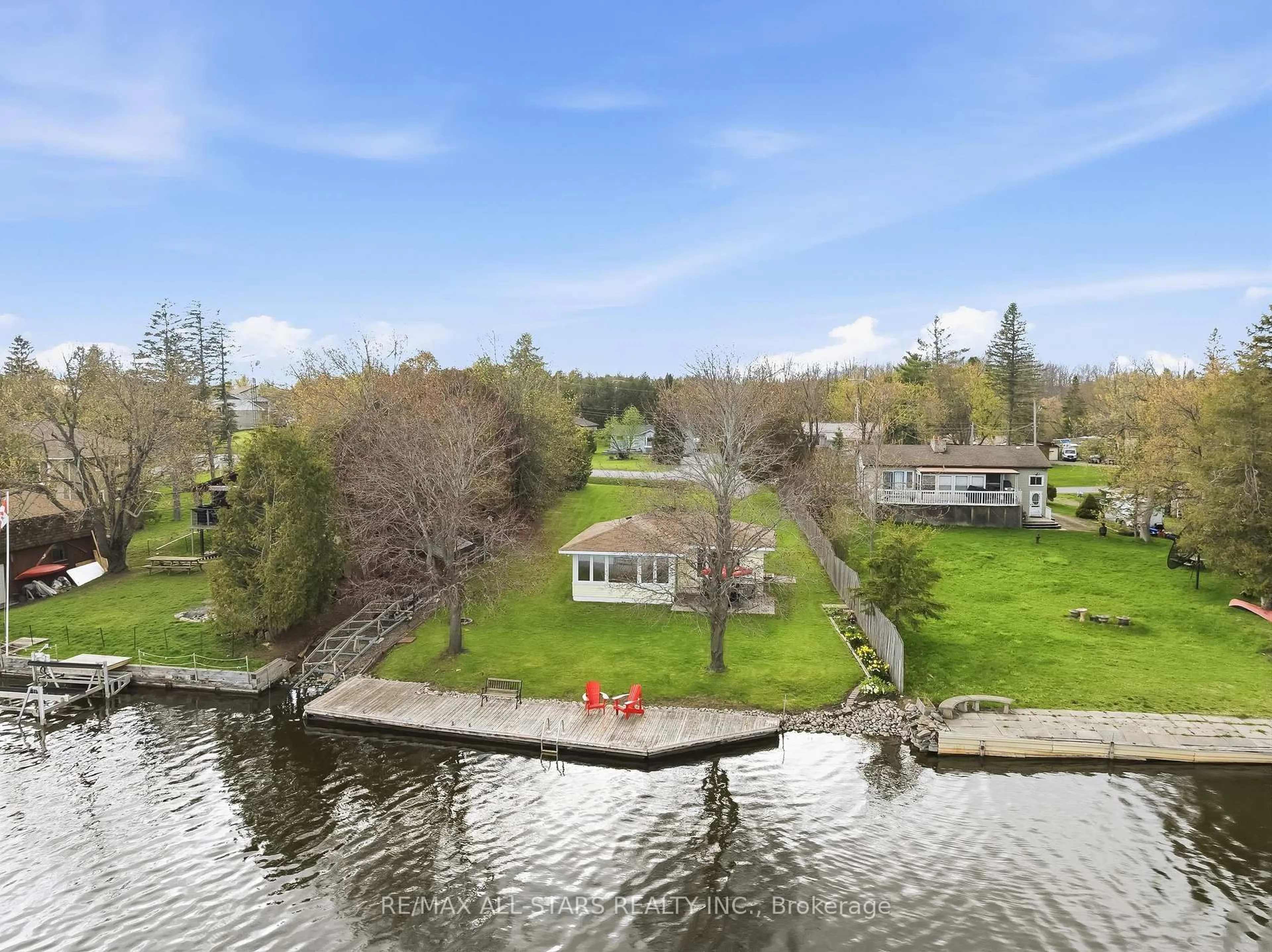 A pic from outside/outdoor area/front of a property/back of a property/a pic from drone, water/lake/river/ocean view for 42 Riverside Dr, Kawartha Lakes Ontario K9V 0H6