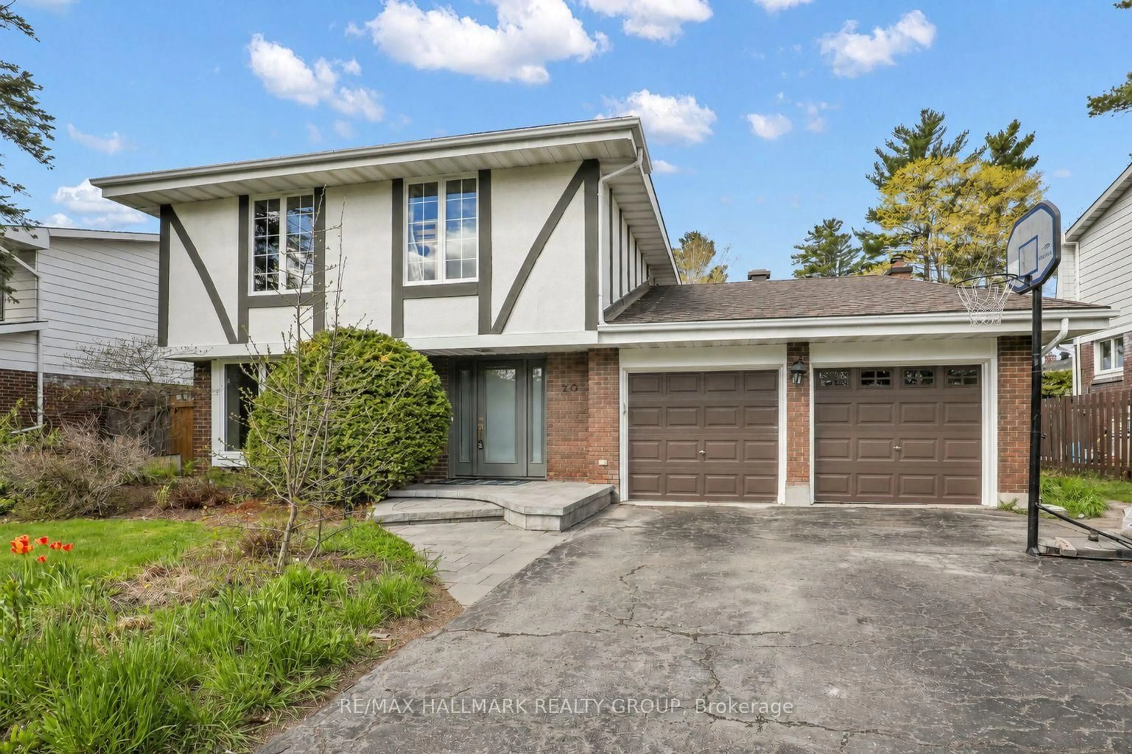 Home with brick exterior material, street for 20 Riverbrook Rd, Ottawa Ontario K2H 7Z5