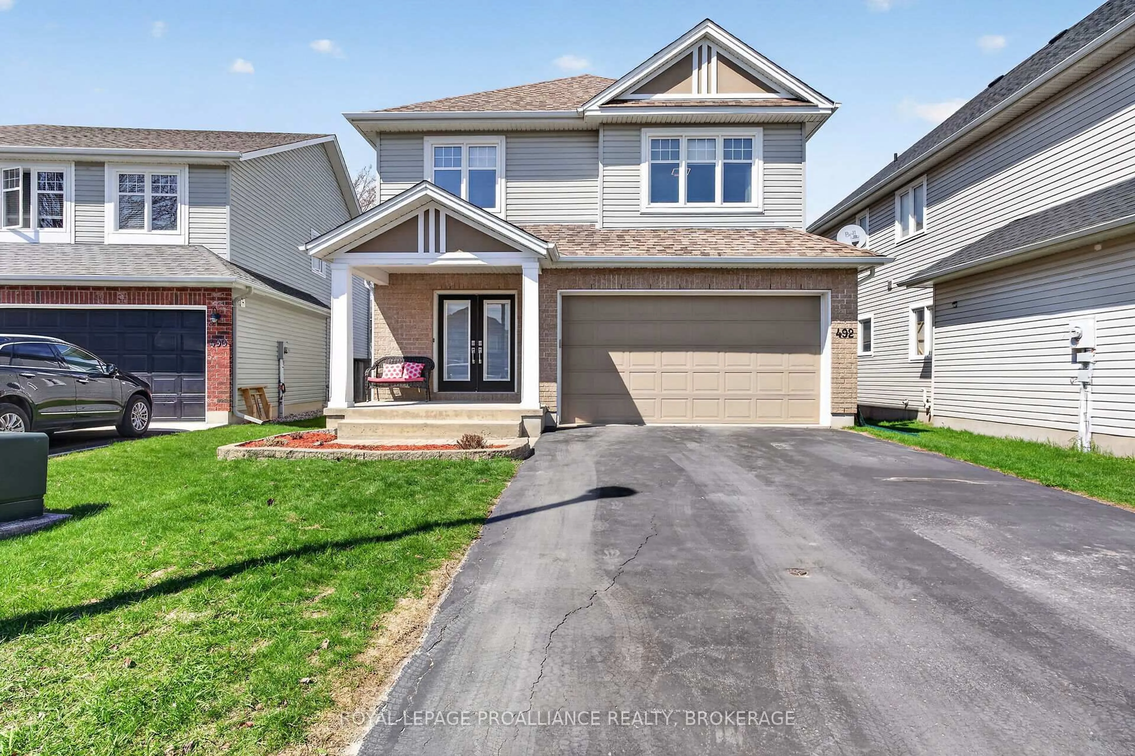 Home with vinyl exterior material, street for 492 Cheryl Pl, Kingston Ontario K7K 0B2