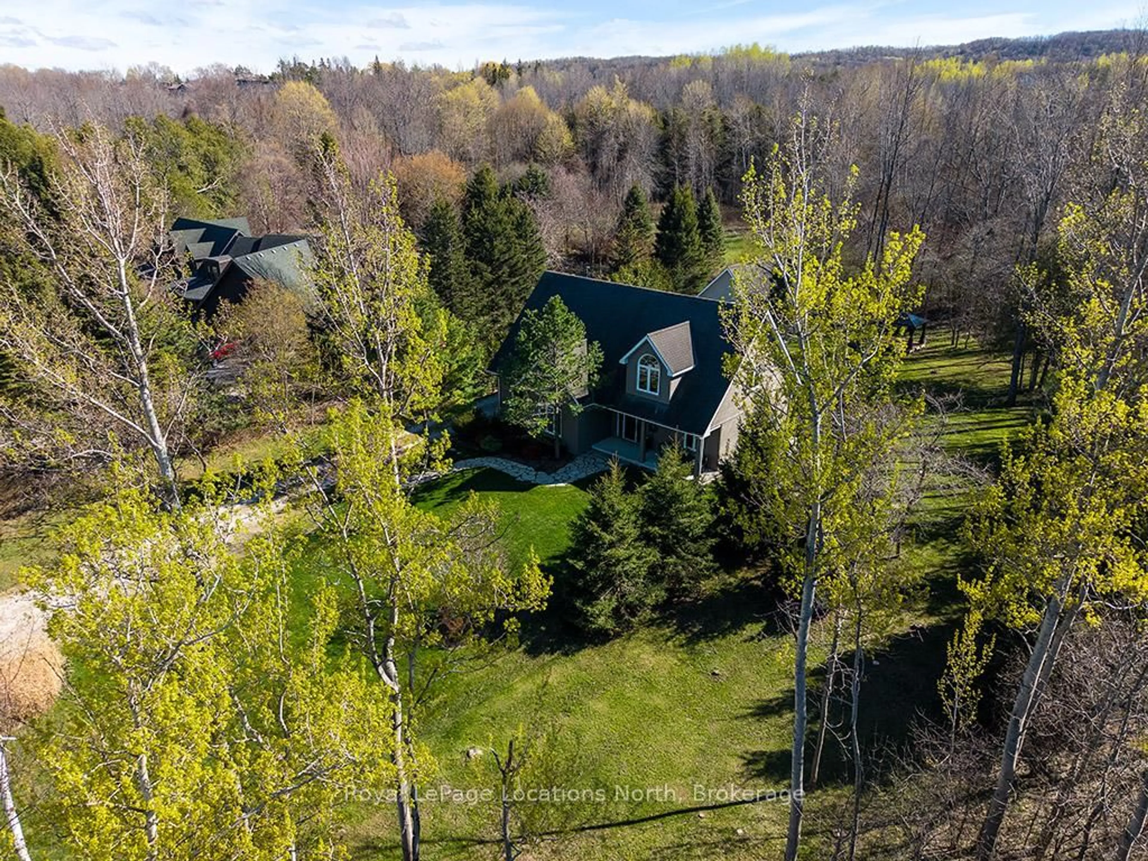 A pic from outside/outdoor area/front of a property/back of a property/a pic from drone, forest/trees view for 166 Sunset Blvd, Blue Mountains Ontario N0H 2P0
