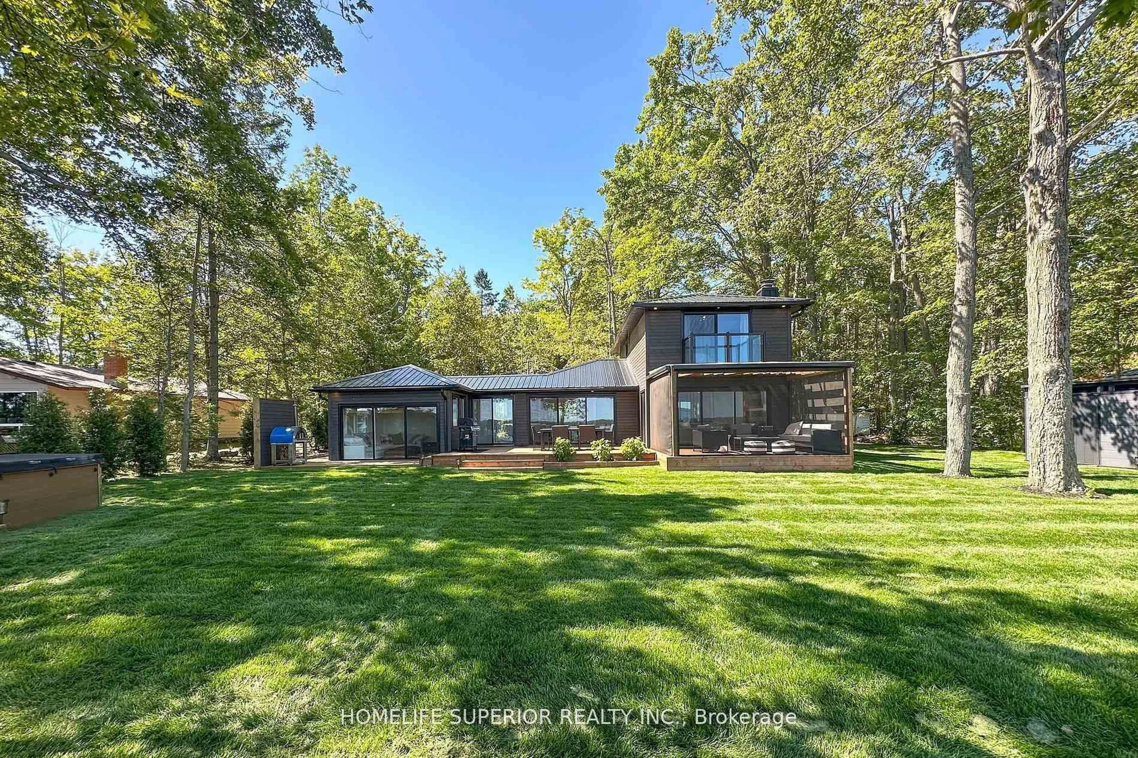 A pic from outside/outdoor area/front of a property/back of a property/a pic from drone, unknown for 110 West Bay Blvd, Kawartha Lakes Ontario K0M 2B0