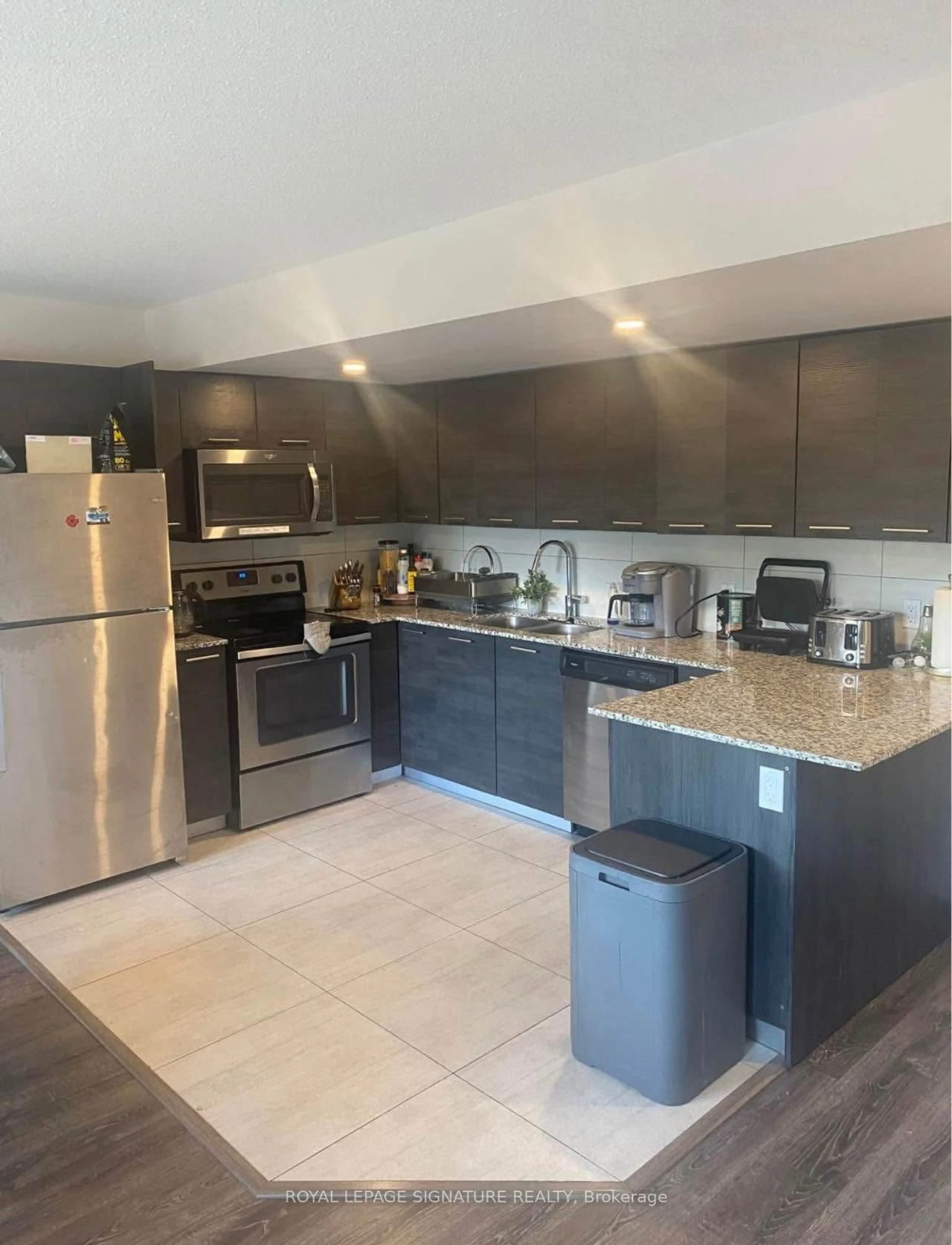 Open concept kitchen, ceramic/tile floor for 288 Albert St #216, Waterloo Ontario N2L 3T8