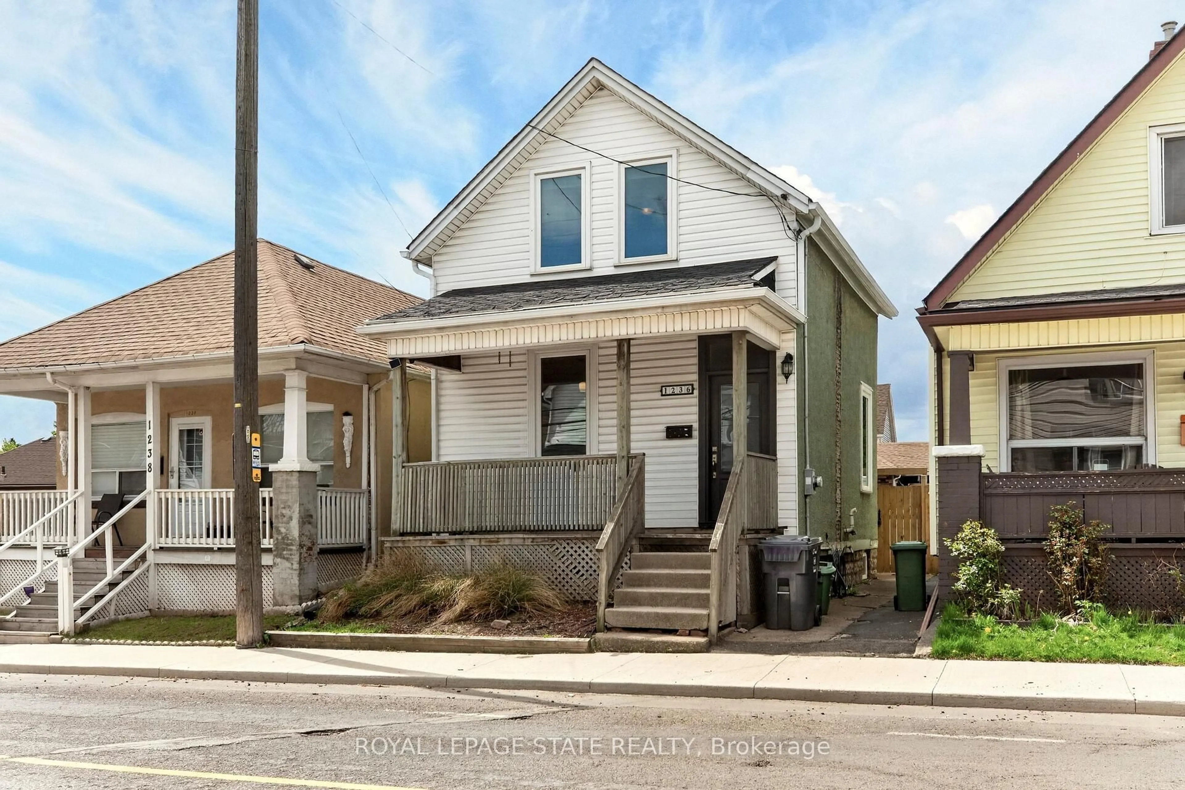 Home with vinyl exterior material, street for 1236 Cannon St, Hamilton Ontario L8H 1V1