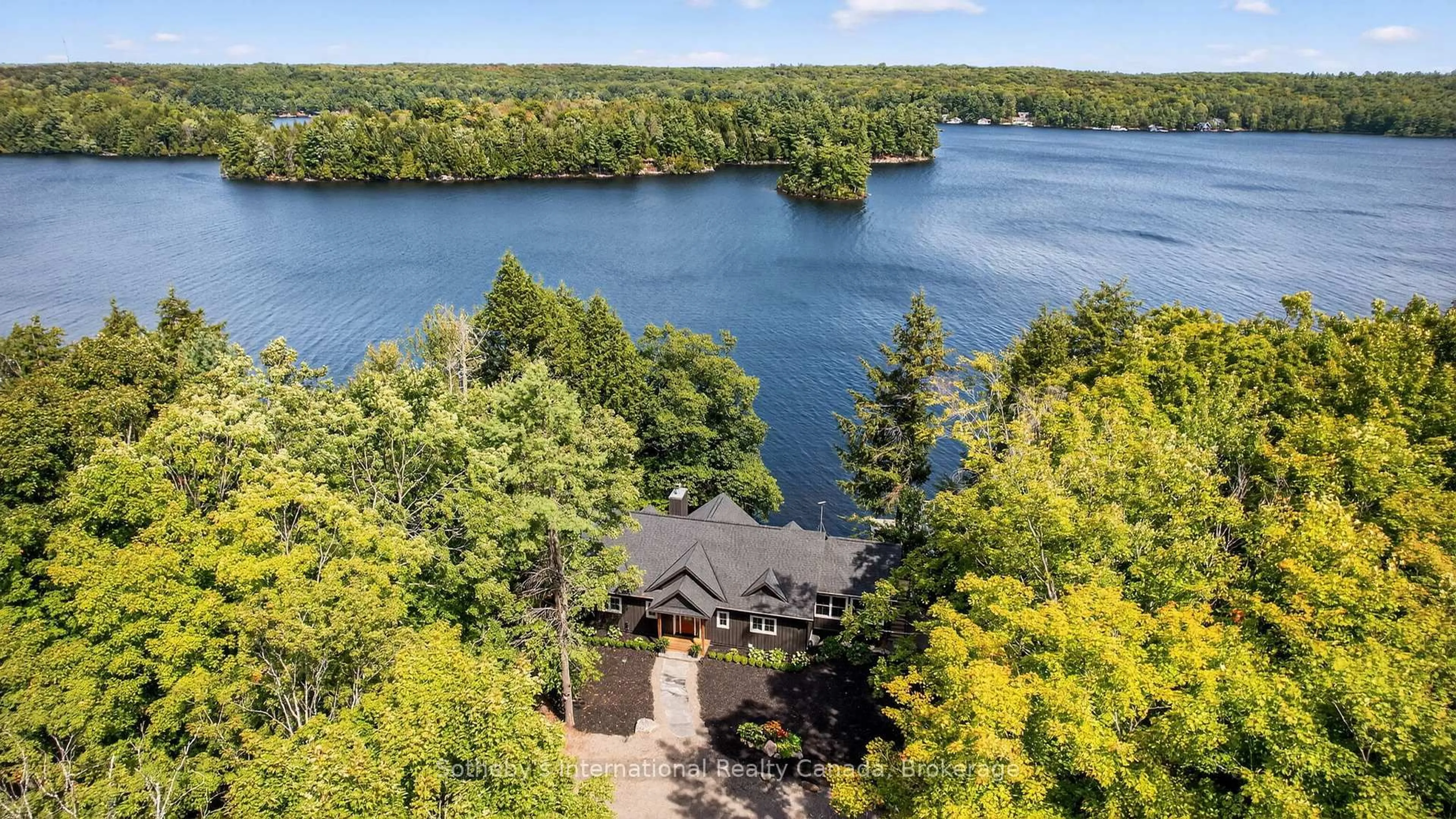 A pic from outside/outdoor area/front of a property/back of a property/a pic from drone, water/lake/river/ocean view for 1160 Whiteside Rd #52, Muskoka Lakes Ontario P0B 1J0
