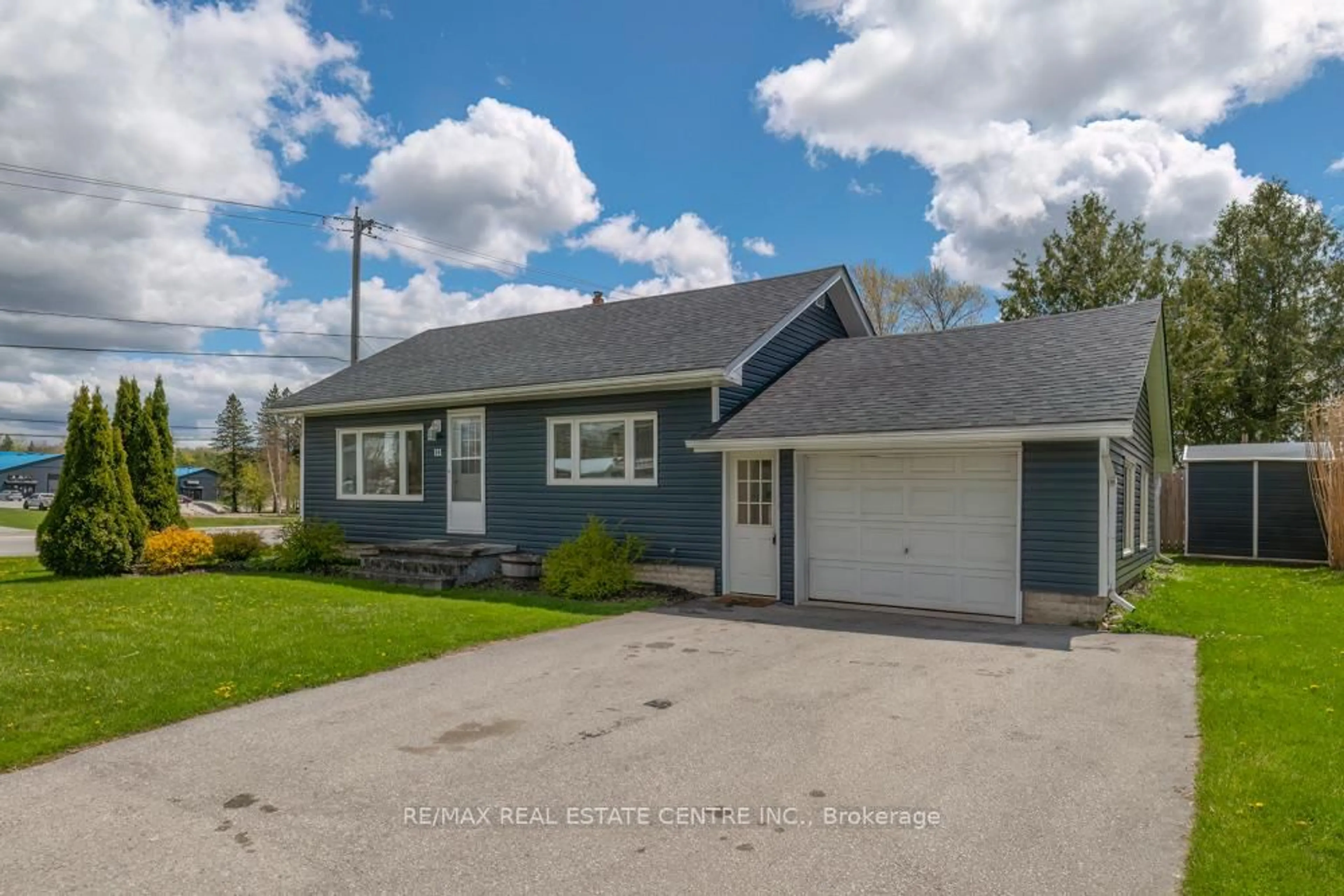 Home with vinyl exterior material, street for 111 Elizabeth St, West Grey Ontario N0G 1R0