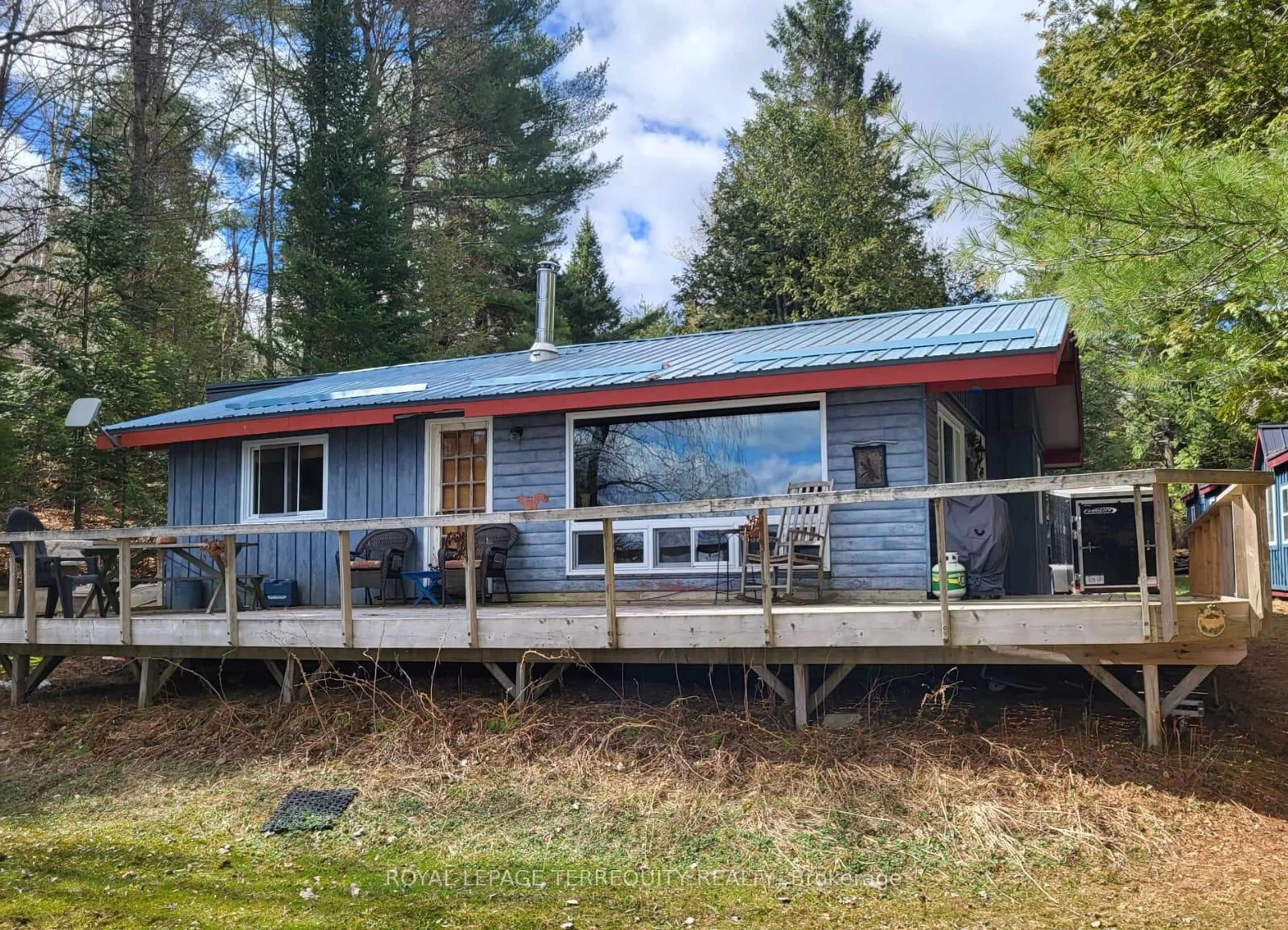 A pic from outside/outdoor area/front of a property/back of a property/a pic from drone, unknown for 1012 Shamrock Lane, Dysart et al Ontario K0M 1S0
