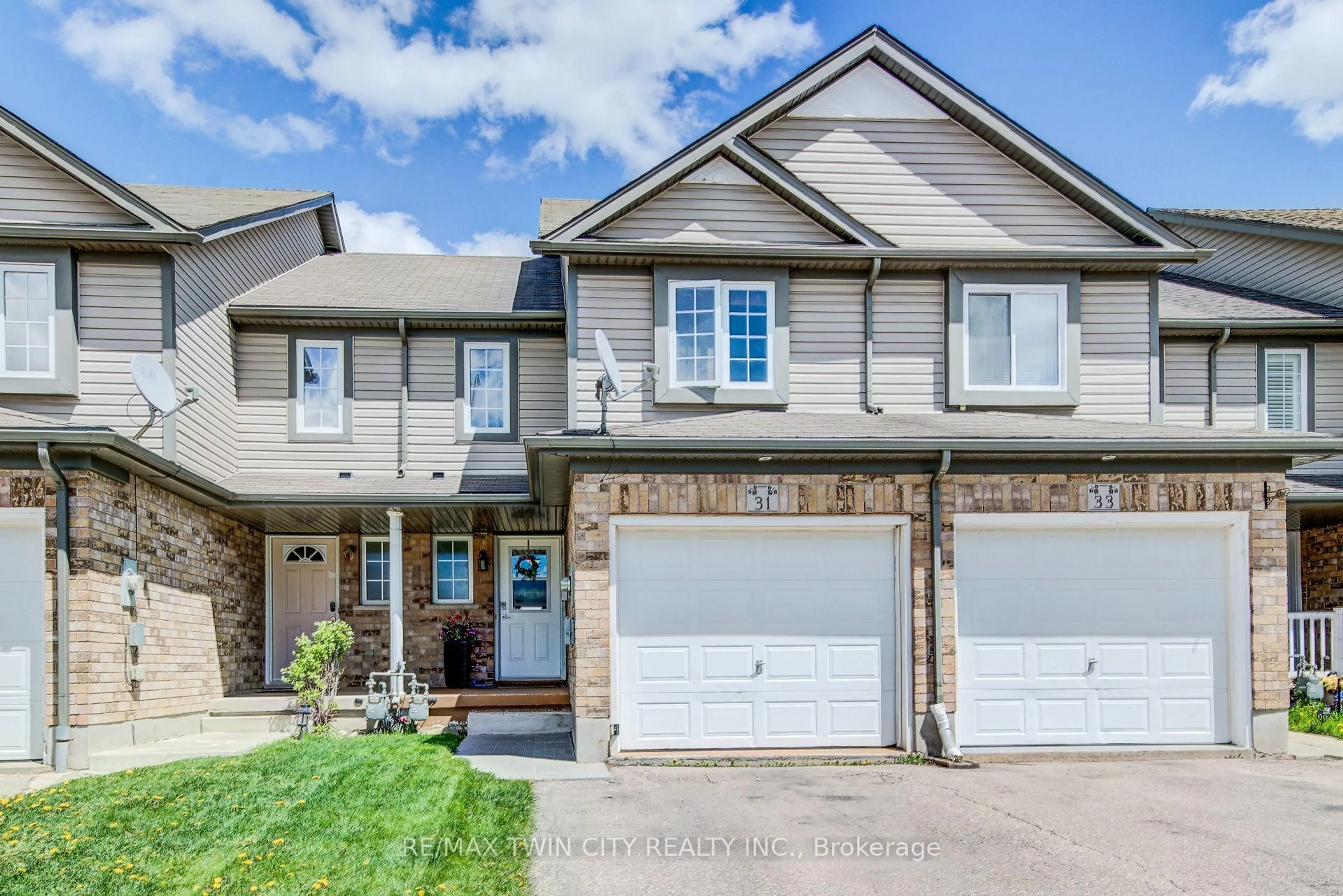 Home with brick exterior material, street for 31 Red Clover Cres, Kitchener Ontario N2E 4G8