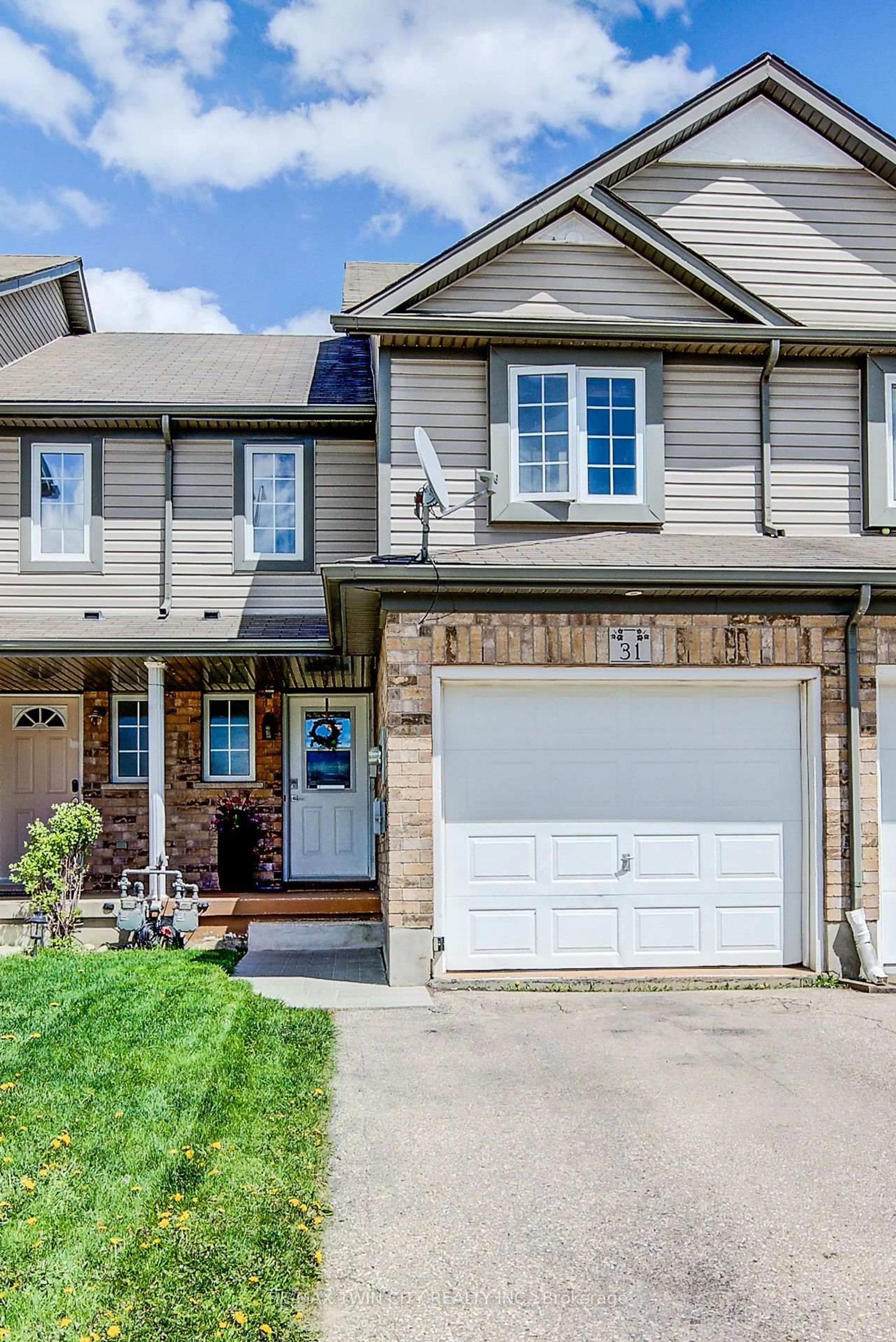 Home with brick exterior material, street for 31 Red Clover Cres, Kitchener Ontario N2E 4G8