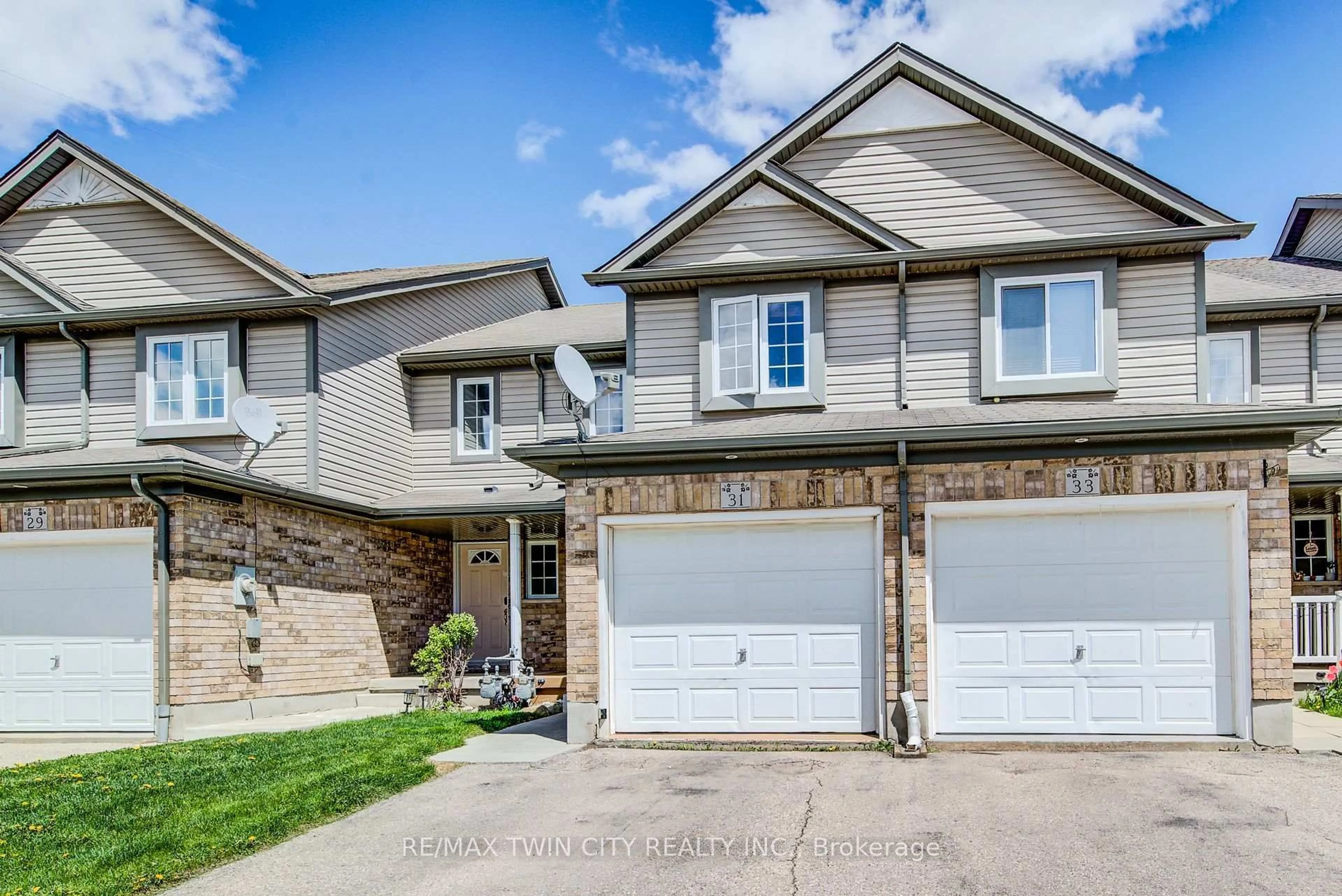 Home with vinyl exterior material, street for 31 Red Clover Cres, Kitchener Ontario N2E 4G8