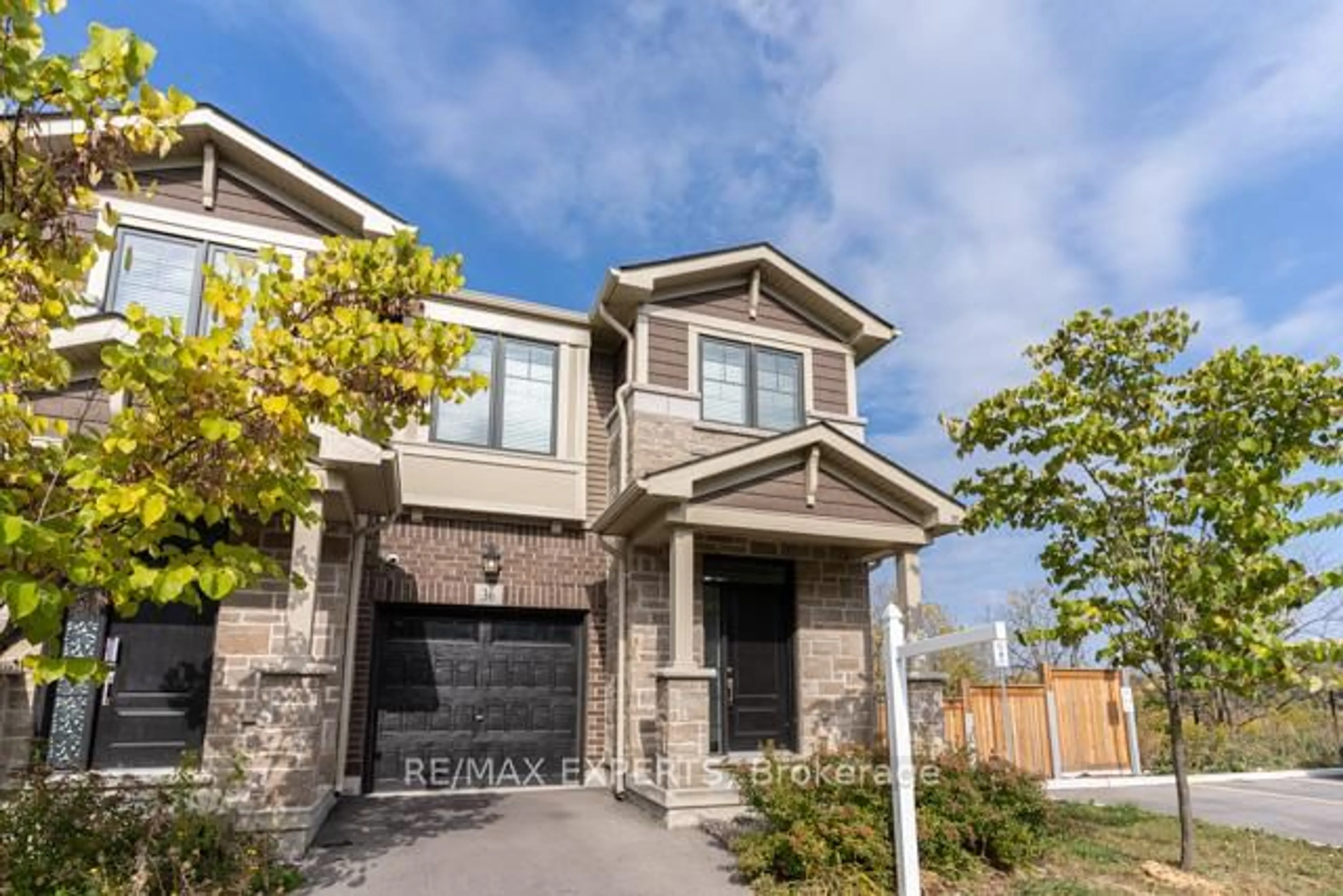 Home with brick exterior material, street for 36 Pelican Lane, Hamilton Ontario L8K 0A4