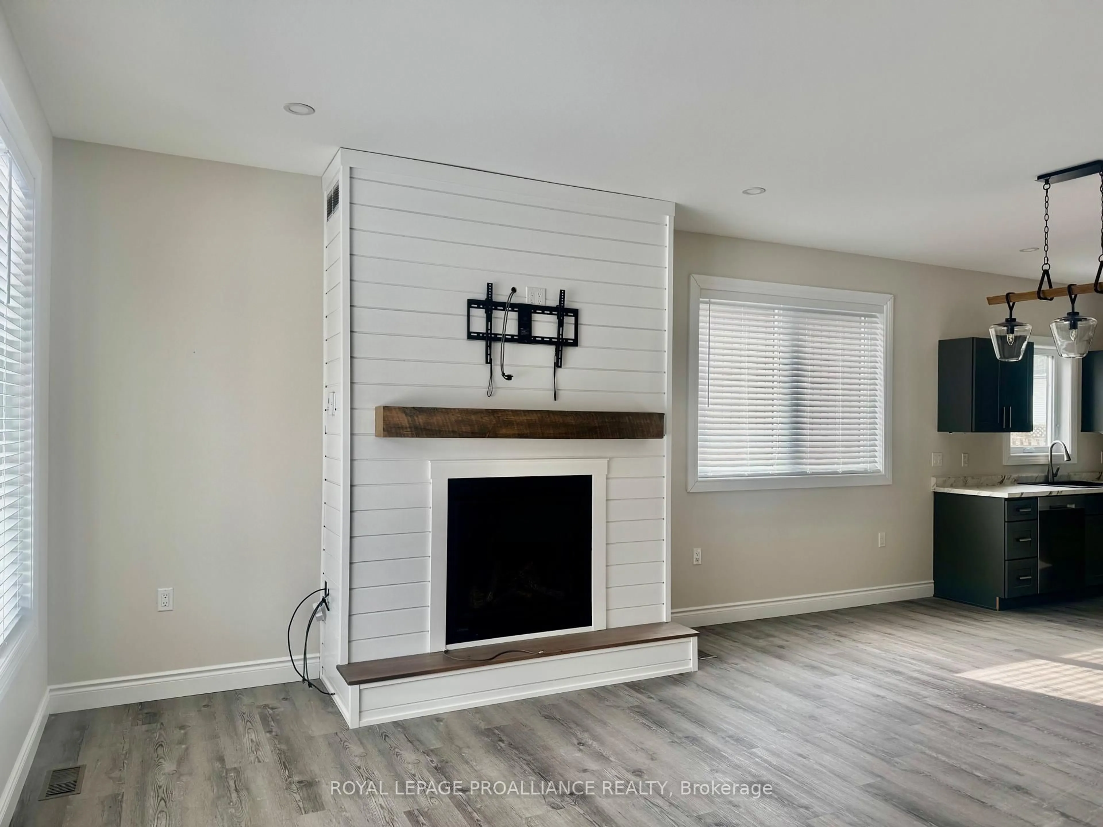 Living room with furniture, wood/laminate floor for 47 South Maloney St St, Limoges Ontario K0K 2M0