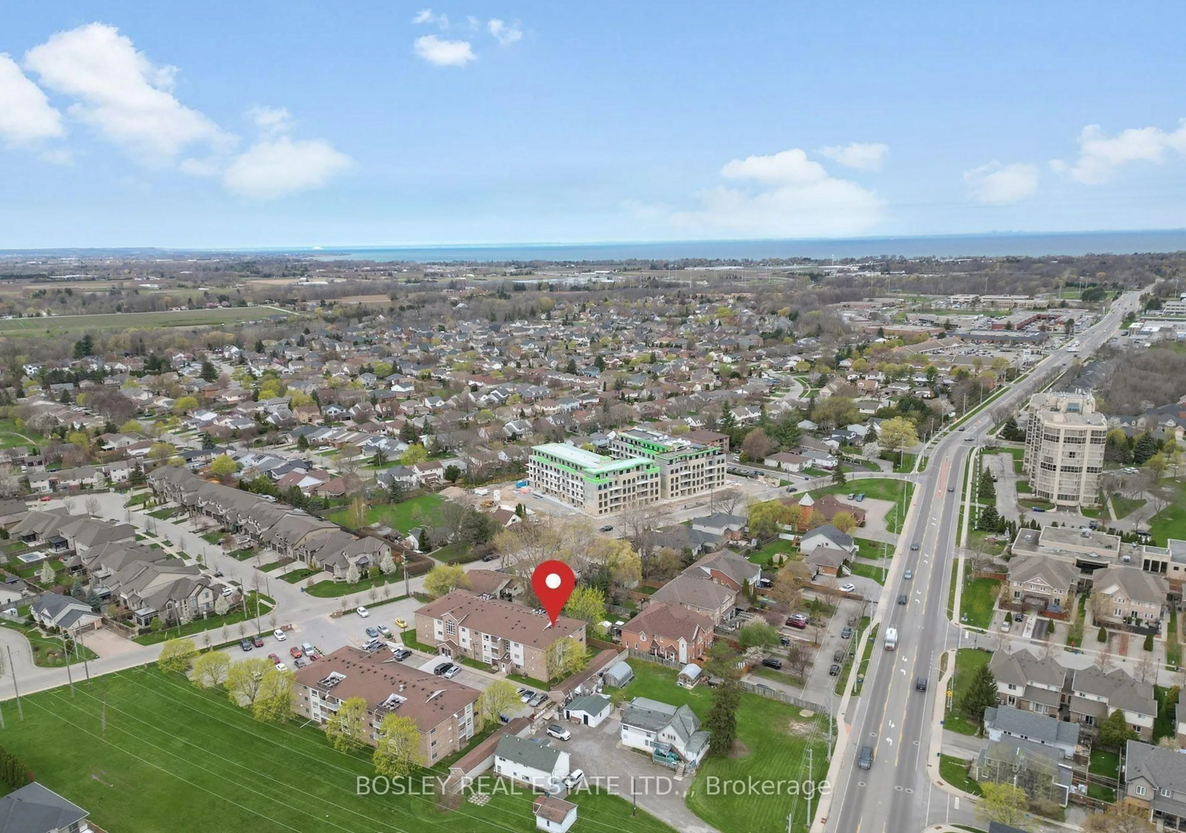 A pic from outside/outdoor area/front of a property/back of a property/a pic from drone, street for 1061 Vansickle Rd #205A, St. Catharines Ontario L2S 2X4