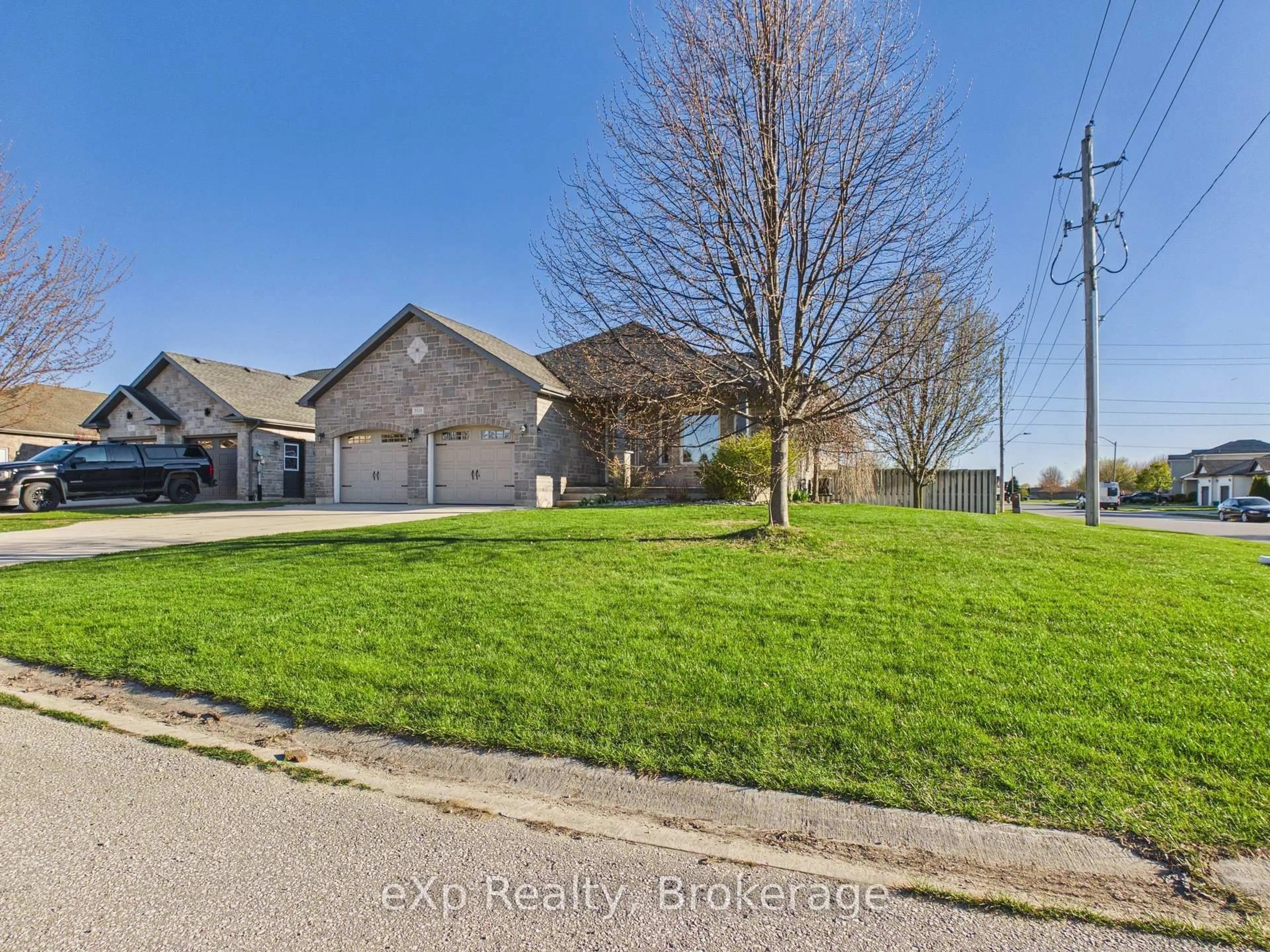 A pic from outside/outdoor area/front of a property/back of a property/a pic from drone, street for 319 Gingrich Cres, Saugeen Shores Ontario N0H 2C1