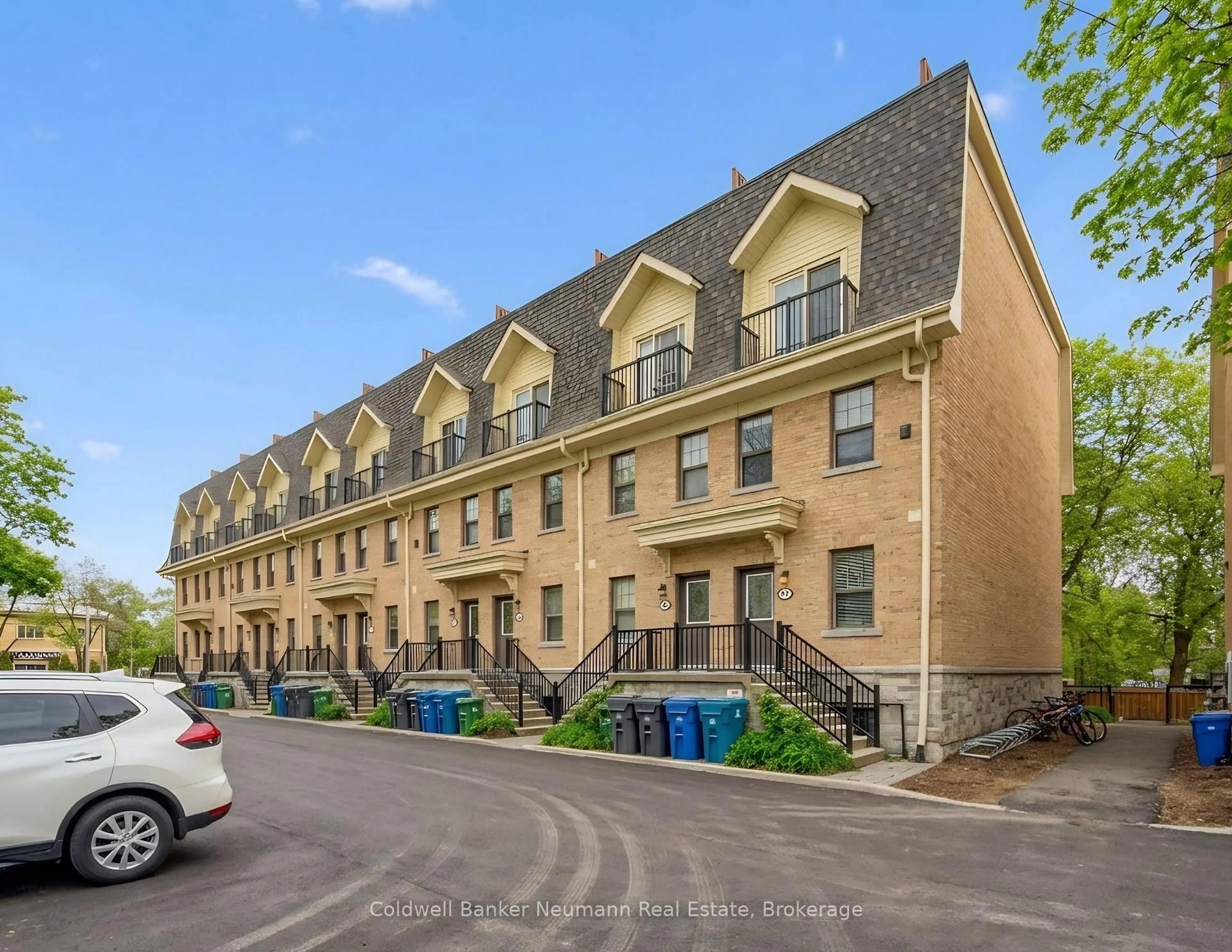 A pic from outside/outdoor area/front of a property/back of a property/a pic from drone, street for 803 Gordon St #9, Guelph Ontario N1G 1Y8