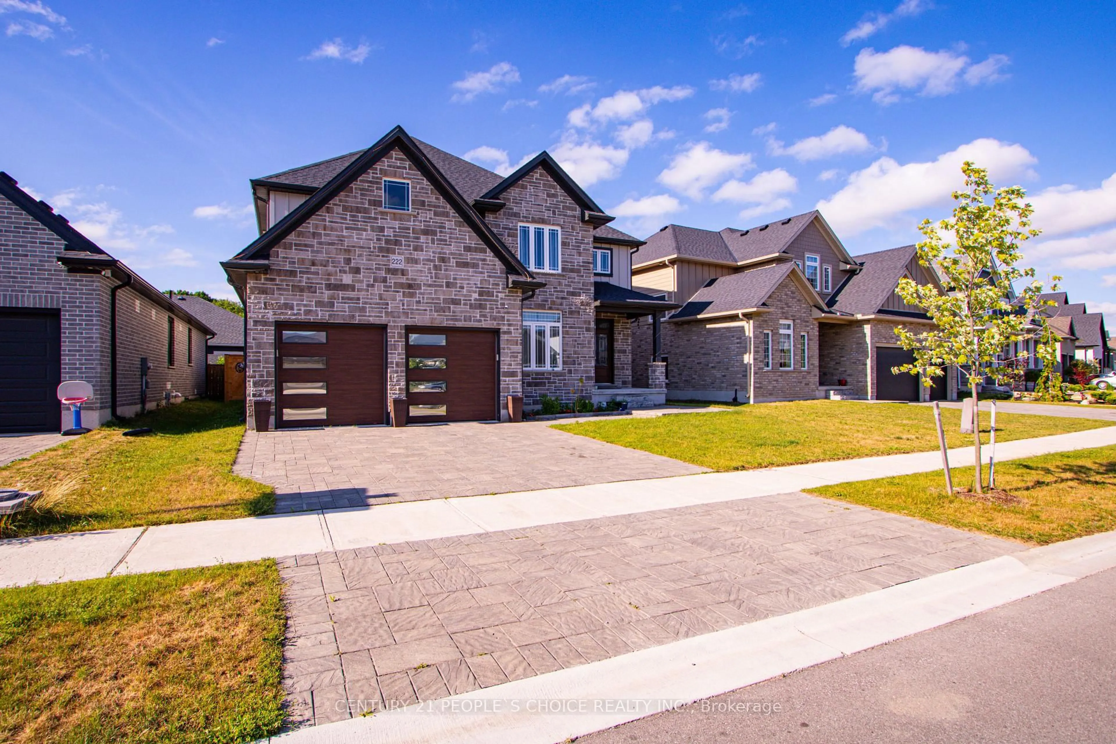 Home with brick exterior material, street for 222 Boardwalk Way, Thames Centre Ontario N0L 1G2