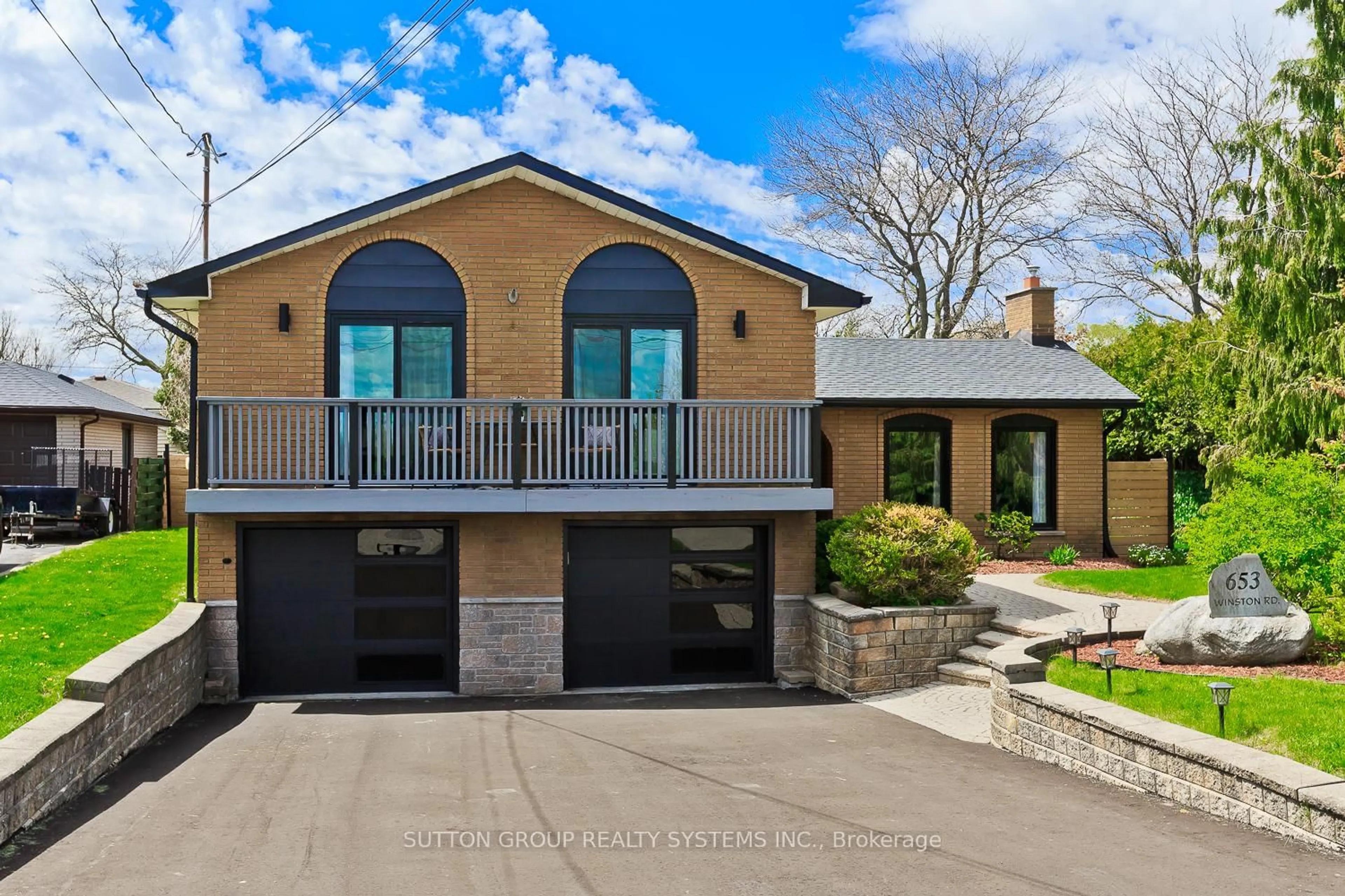 Home with brick exterior material, street for 653 Winston Rd, Grimsby Ontario L3M 4E8