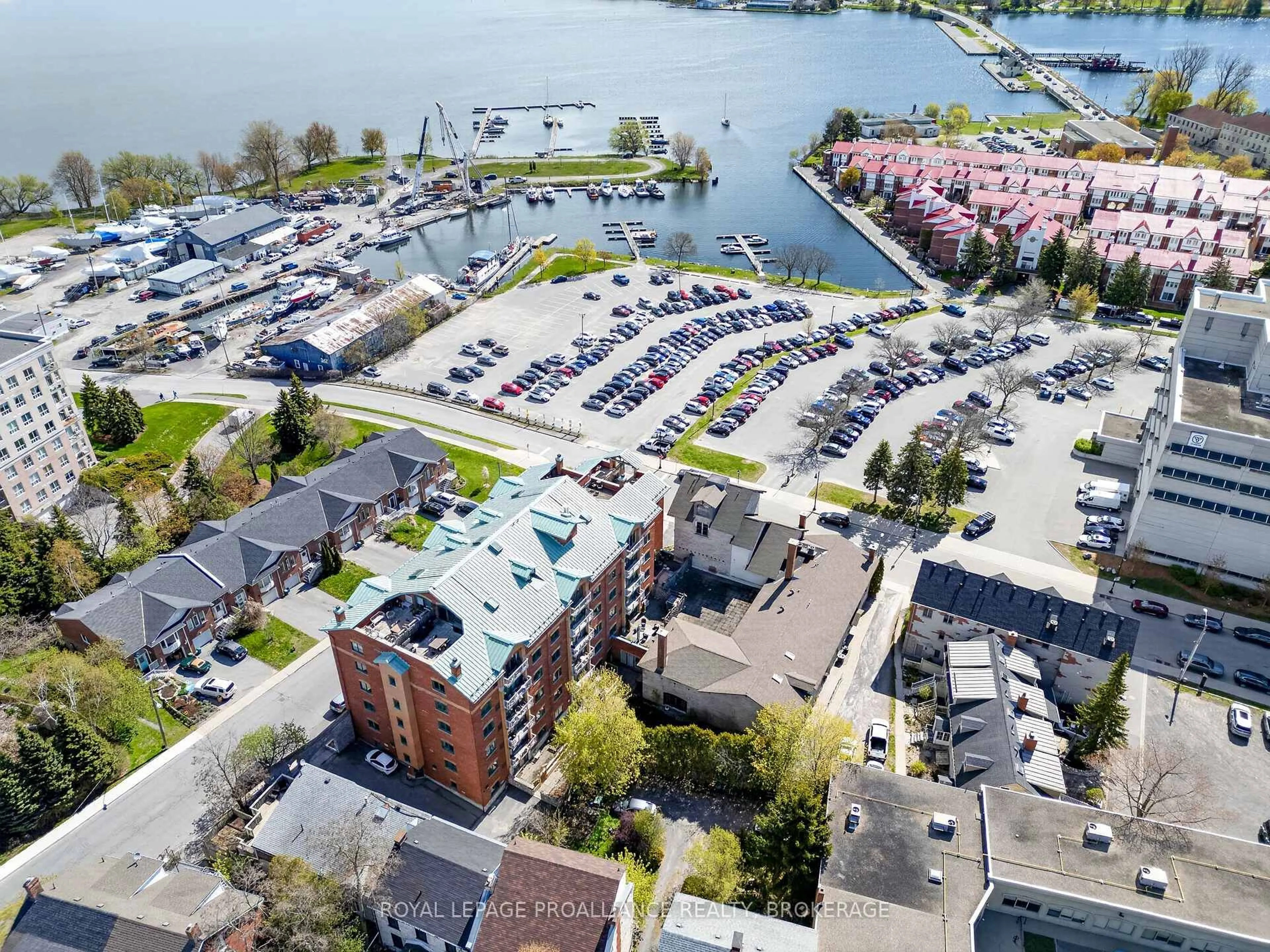 A pic from outside/outdoor area/front of a property/back of a property/a pic from drone, water/lake/river/ocean view for 2 Bay St #202, Kingston Ontario K7K 6T7