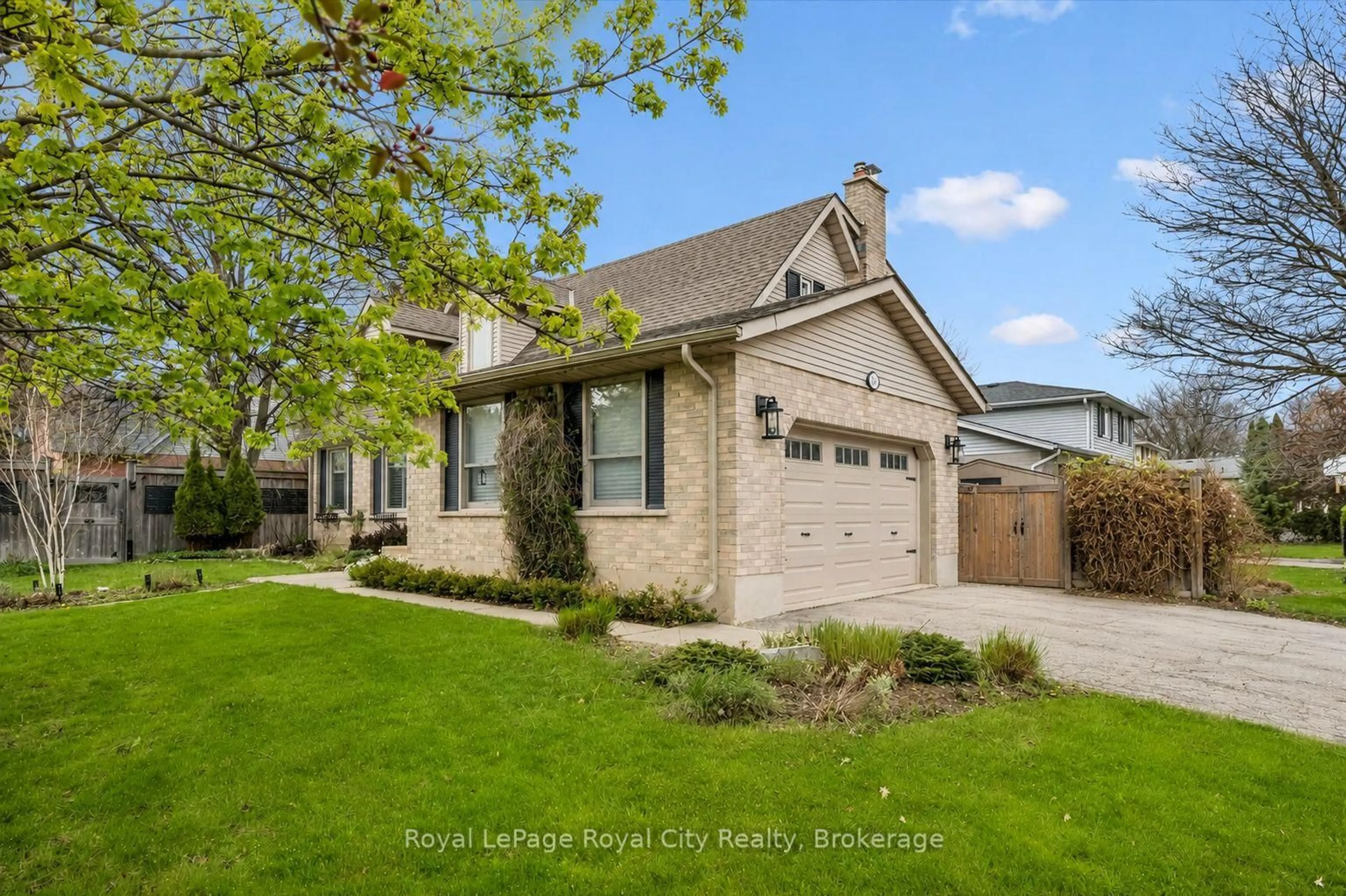 Home with brick exterior material, street for 184 Harvard Rd, Guelph Ontario N1G 4K5