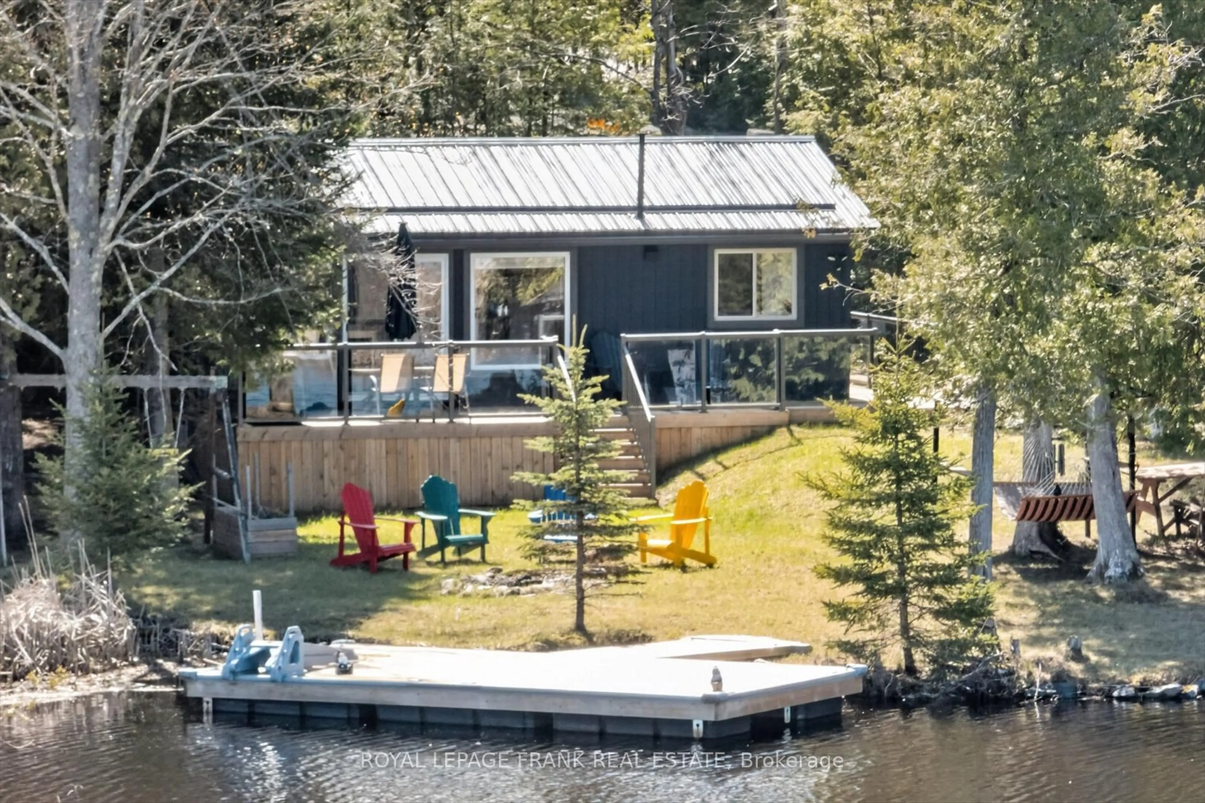 A pic from outside/outdoor area/front of a property/back of a property/a pic from drone, water/lake/river/ocean view for 42 Sunset Crt, Trent Lakes Ontario K0M 1A0