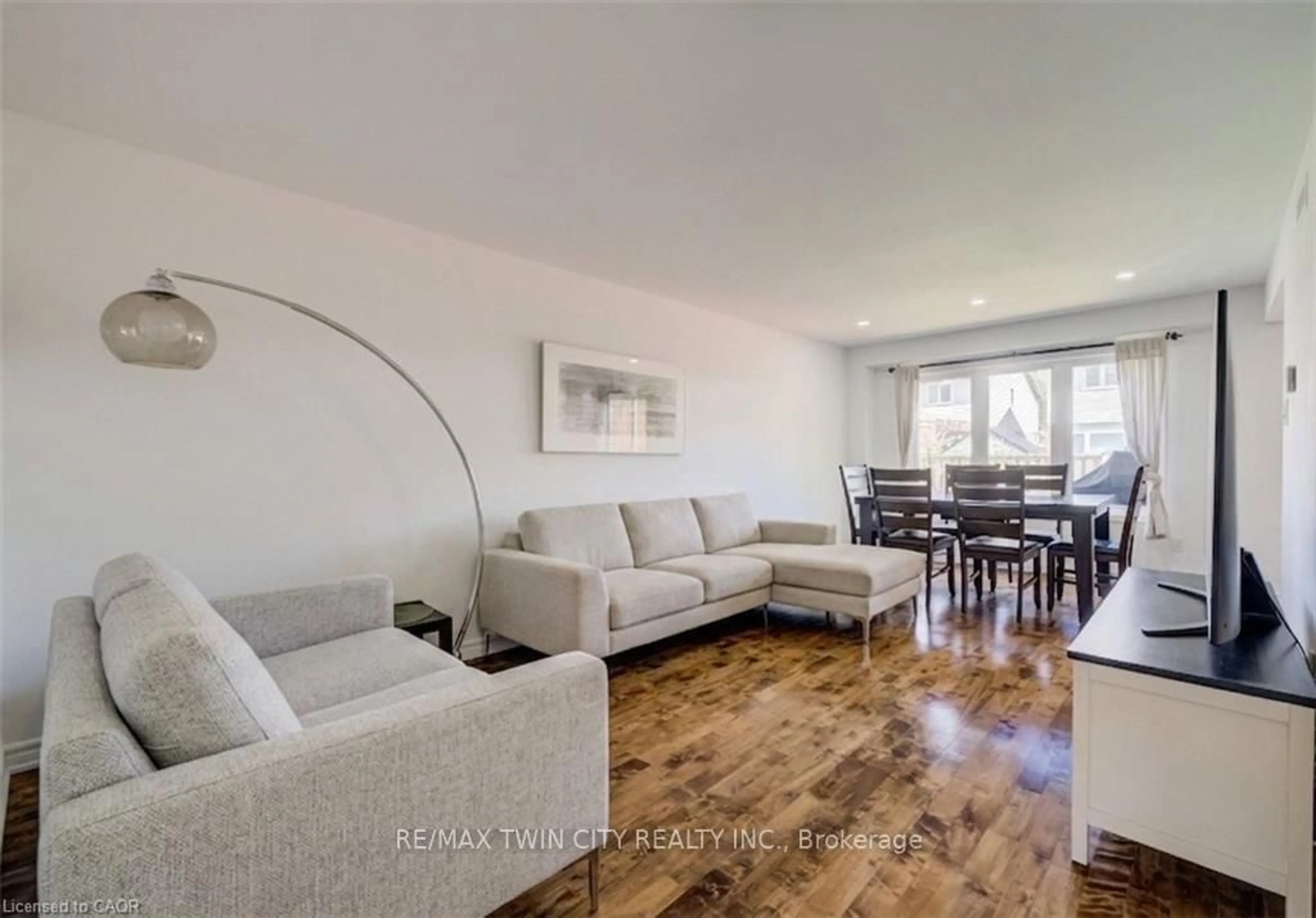 Living room with furniture, wood/laminate floor for 466A EXMOOR St, Waterloo Ontario N2K 3T7