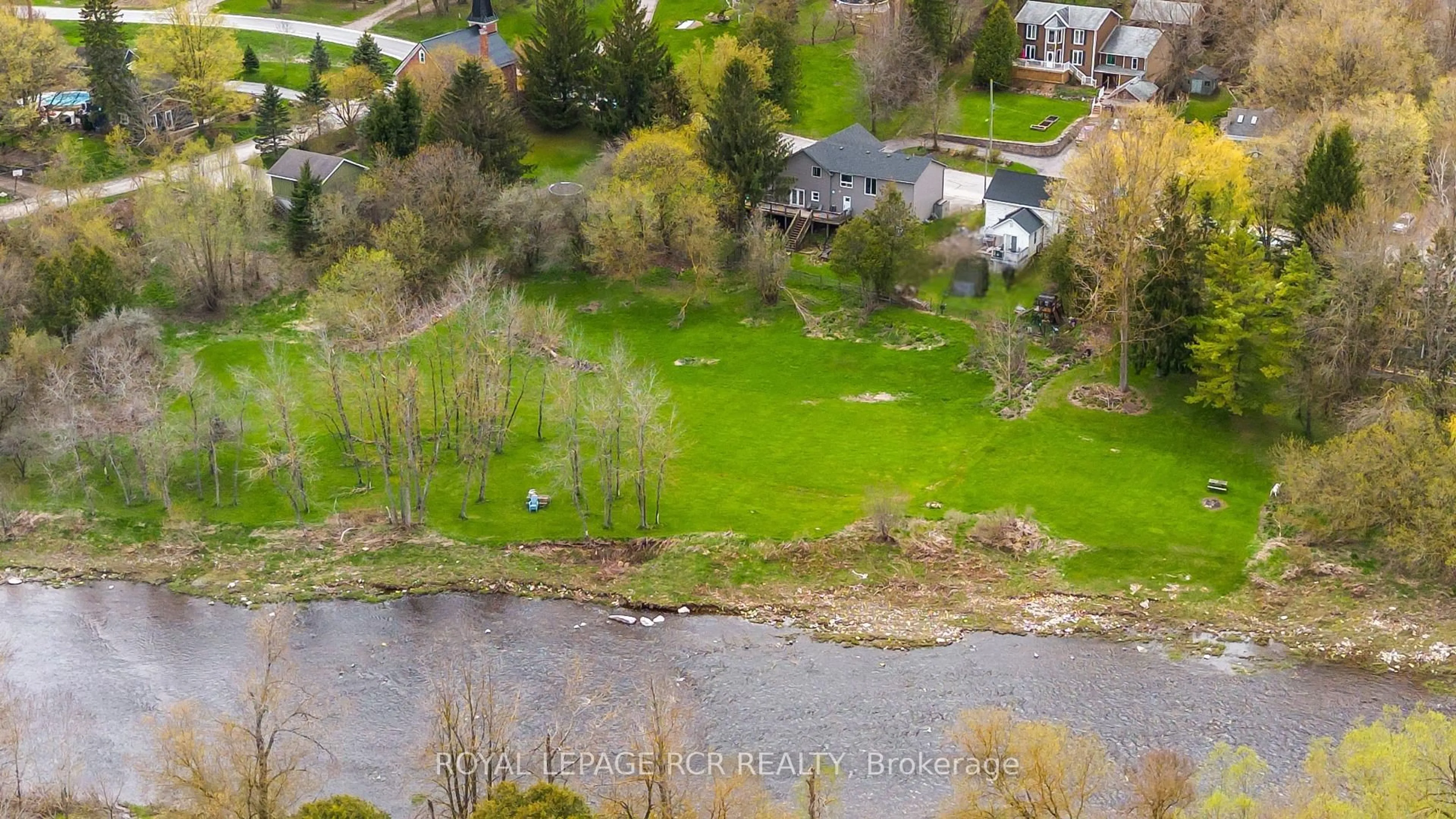 A pic from outside/outdoor area/front of a property/back of a property/a pic from drone, water/lake/river/ocean view for 12 Mill St, Amaranth Ontario L9W 3Z3
