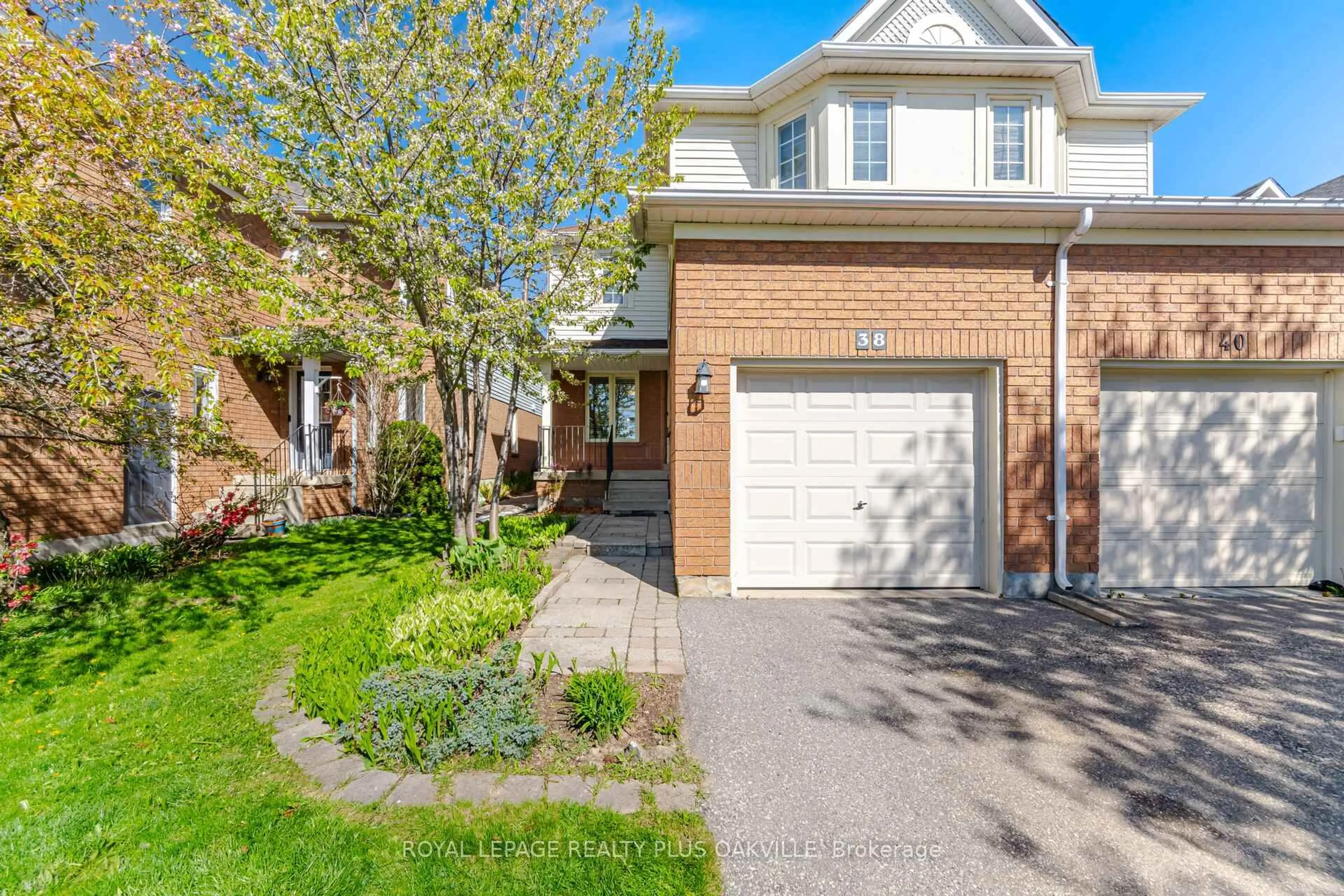 Home with brick exterior material, street for 38 Houndtrail Dr, Hamilton Ontario L8B 0N4