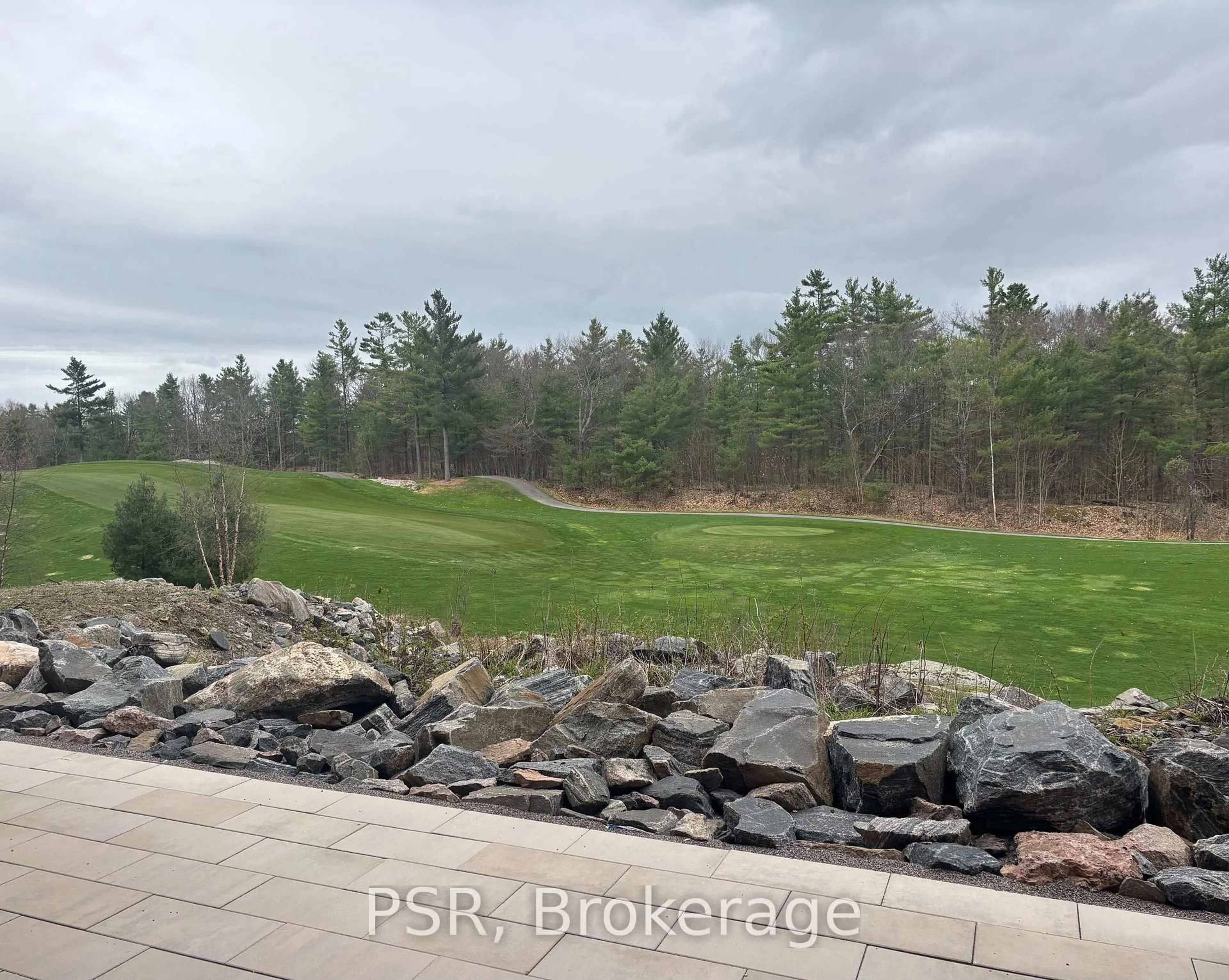 A pic from outside/outdoor area/front of a property/back of a property/a pic from drone, forest/trees view for 100 Carrick Tr #108, Gravenhurst Ontario P1P 0J5