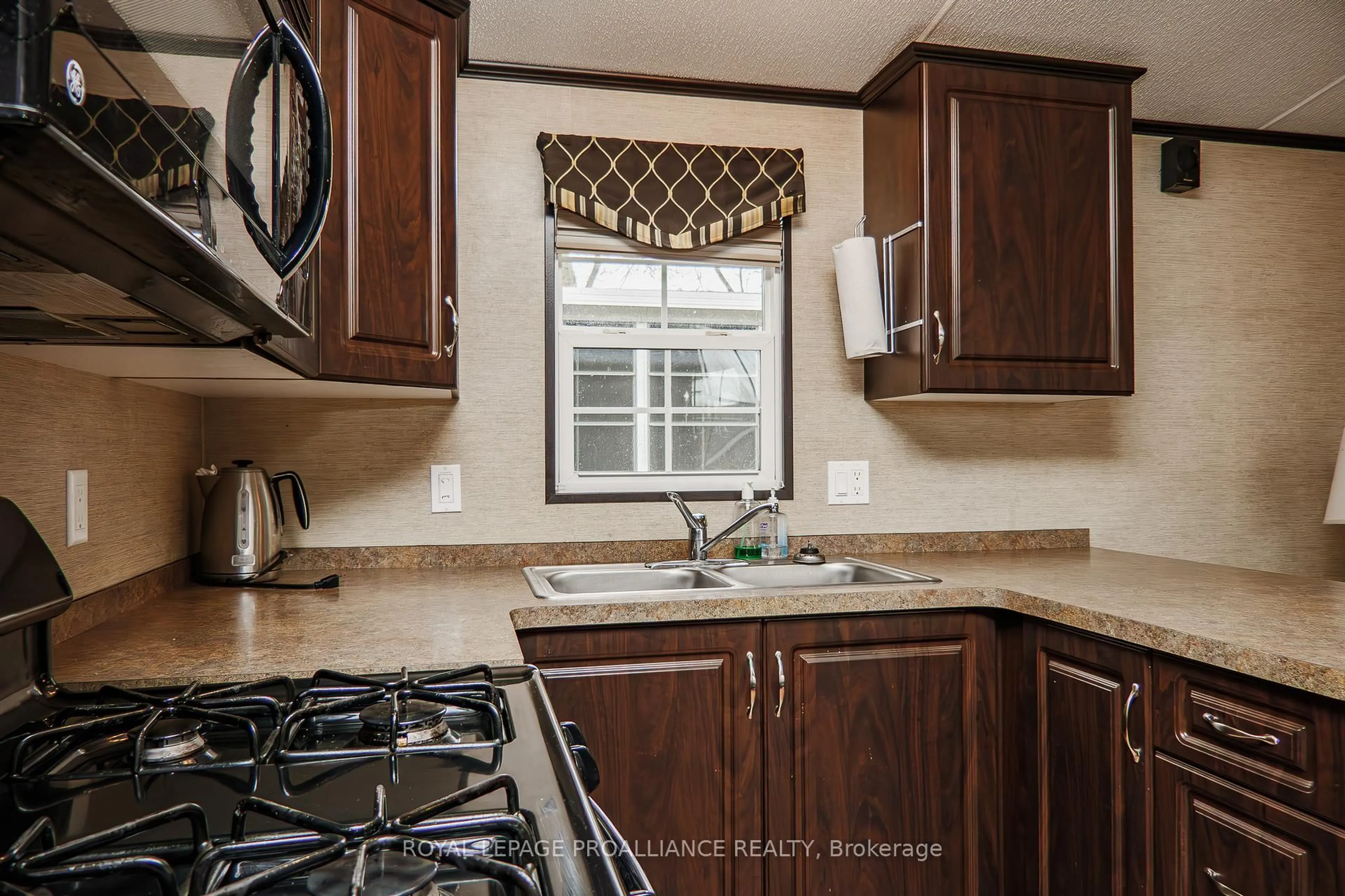 Standard kitchen, ceramic/tile floor for 486 County Rd 1 1 Park Meadow Lane, Prince Edward County Ontario K0K 1P0