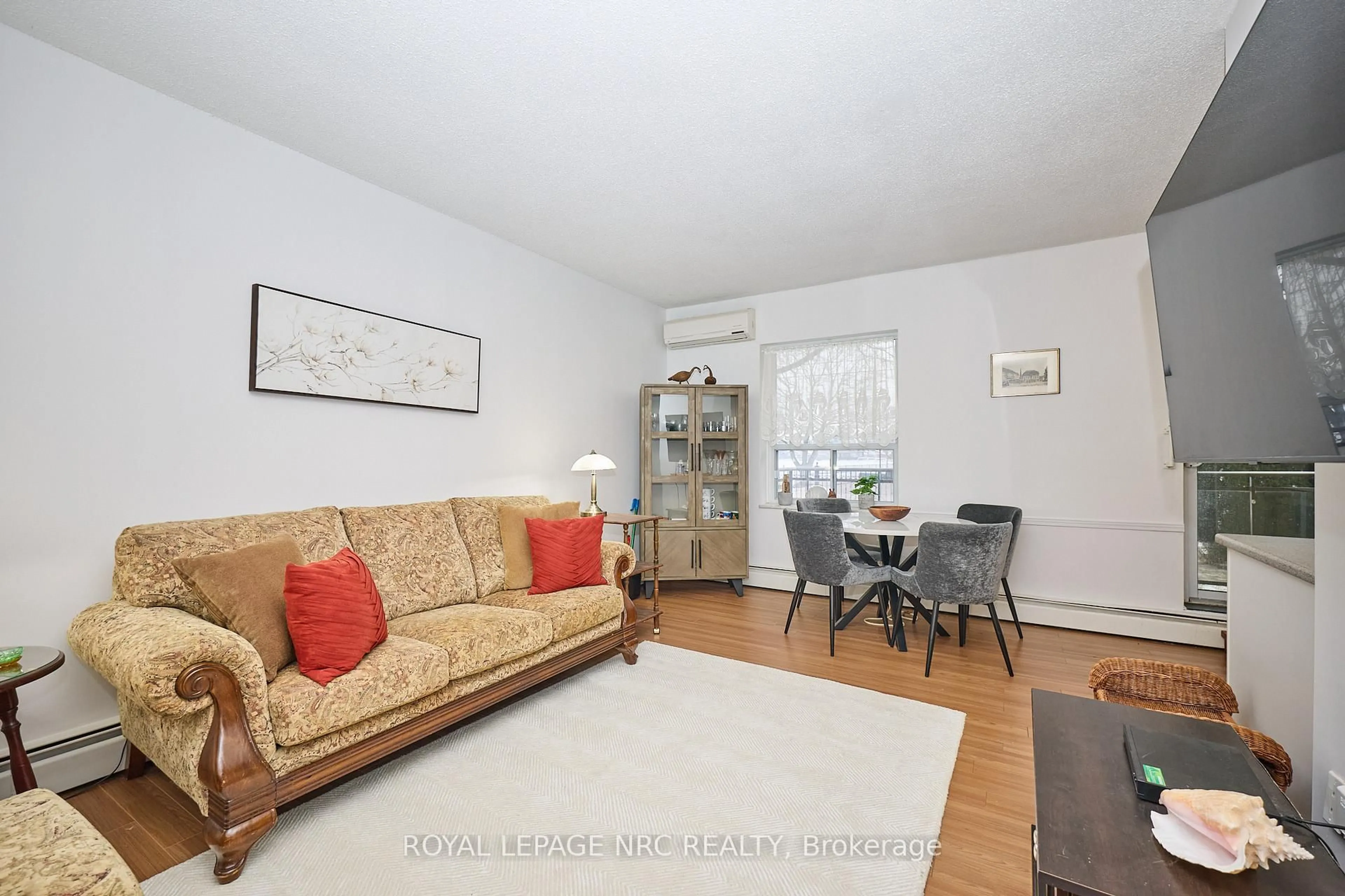 Living room with furniture, unknown for 6390 Huggins St #101, Niagara Falls Ontario L2J 1H1